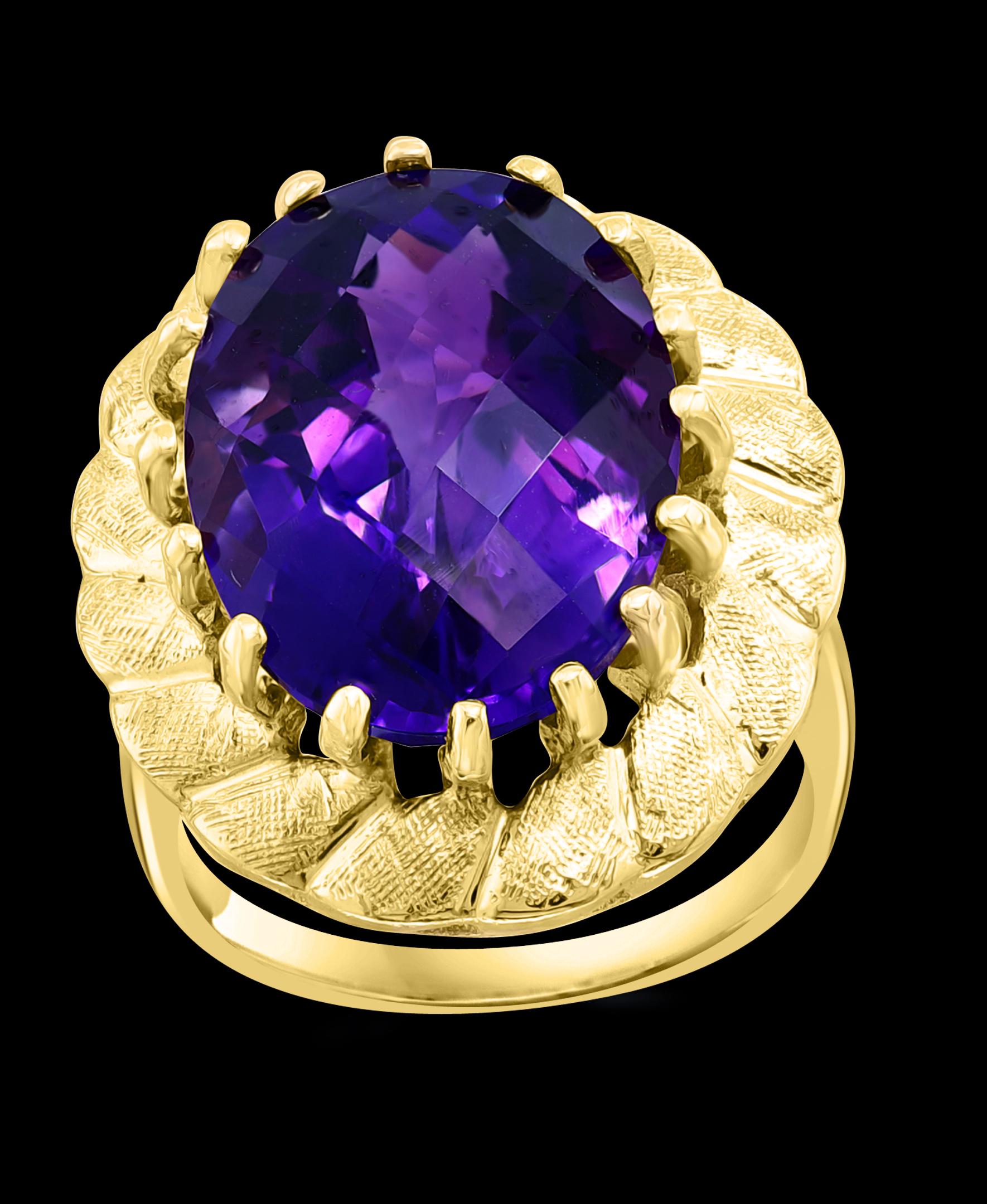 Approximately 10 Carat Checker board Amethyst Cocktail Ring in 14 Karat Yellow Gold Size 6.5
This is a Beautiful Cocktail ring ring which has a large approximately 10  carat of high quality Amethyst . Color and clarity is extremely nice. Large Oval