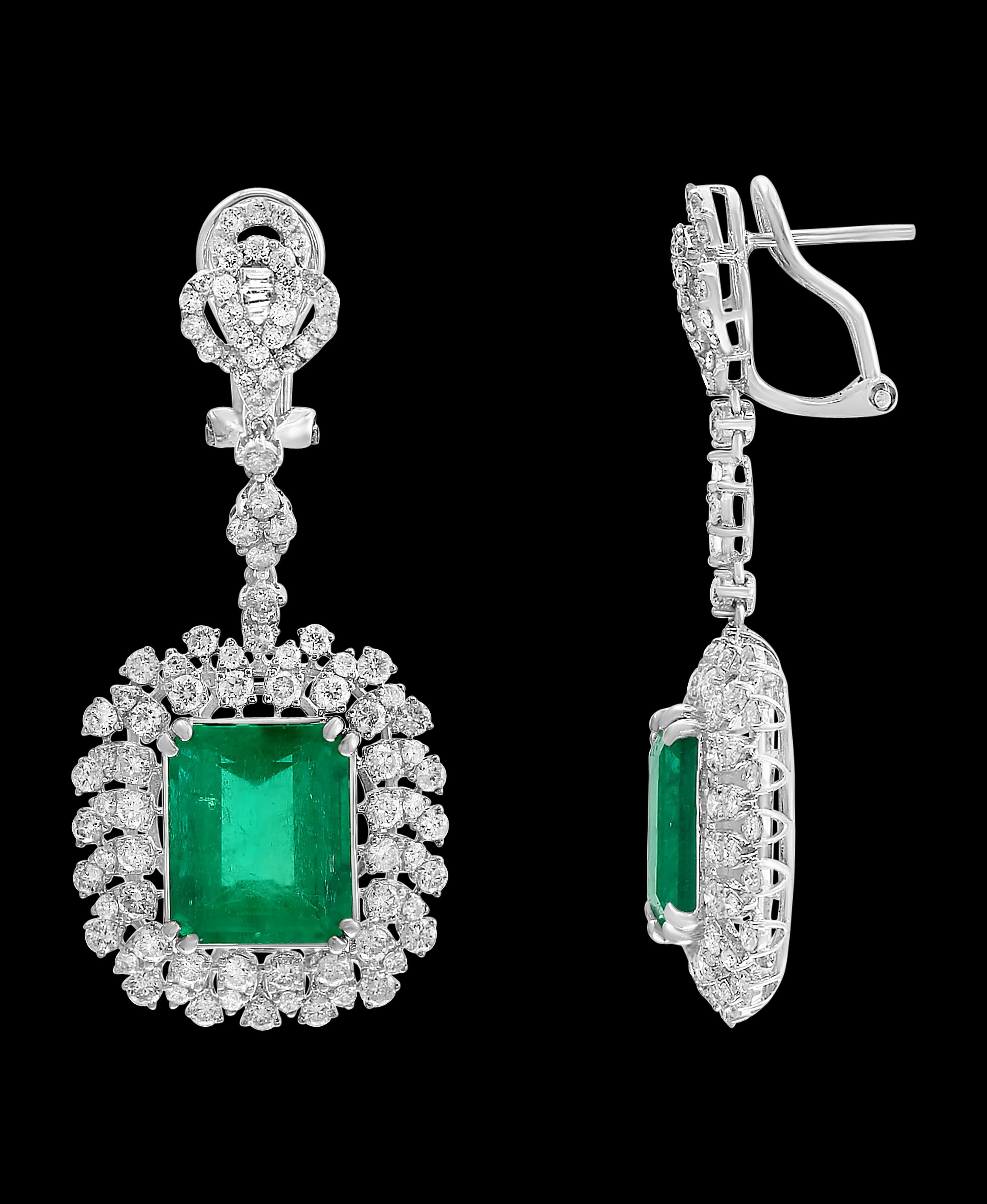 10 Carat Colombian Emerald Cut Emerald Diamond  Hanging Earrings 18 K White Gold
This exquisite pair of earrings are beautifully crafted with 18 karat White gold  weighing    12 grams
Two fine Natural  Colombian  Emerald  Cut Emeralds weighing