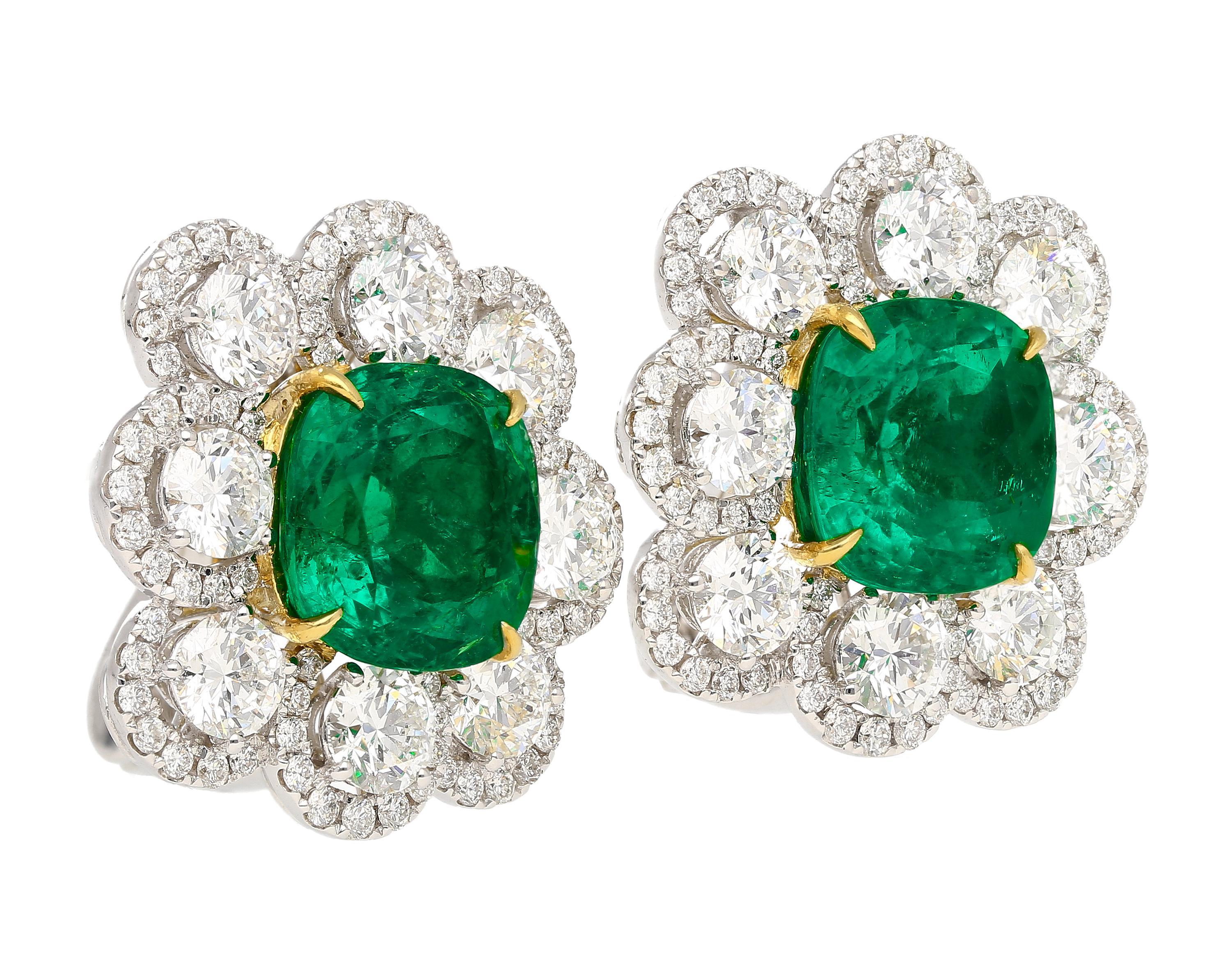 Jewelry Details:
Item Type: Earrings
Metal Type: 18K White and Yellow Gold
Weight: 14.11 grams

Center Stone Details:
Gemstone Type: Colombian Emerald
Carat: 4.81 carats and 4.51 carats
Cut: Cushion Cut
Color: Vivid Green
Oil Treatment: