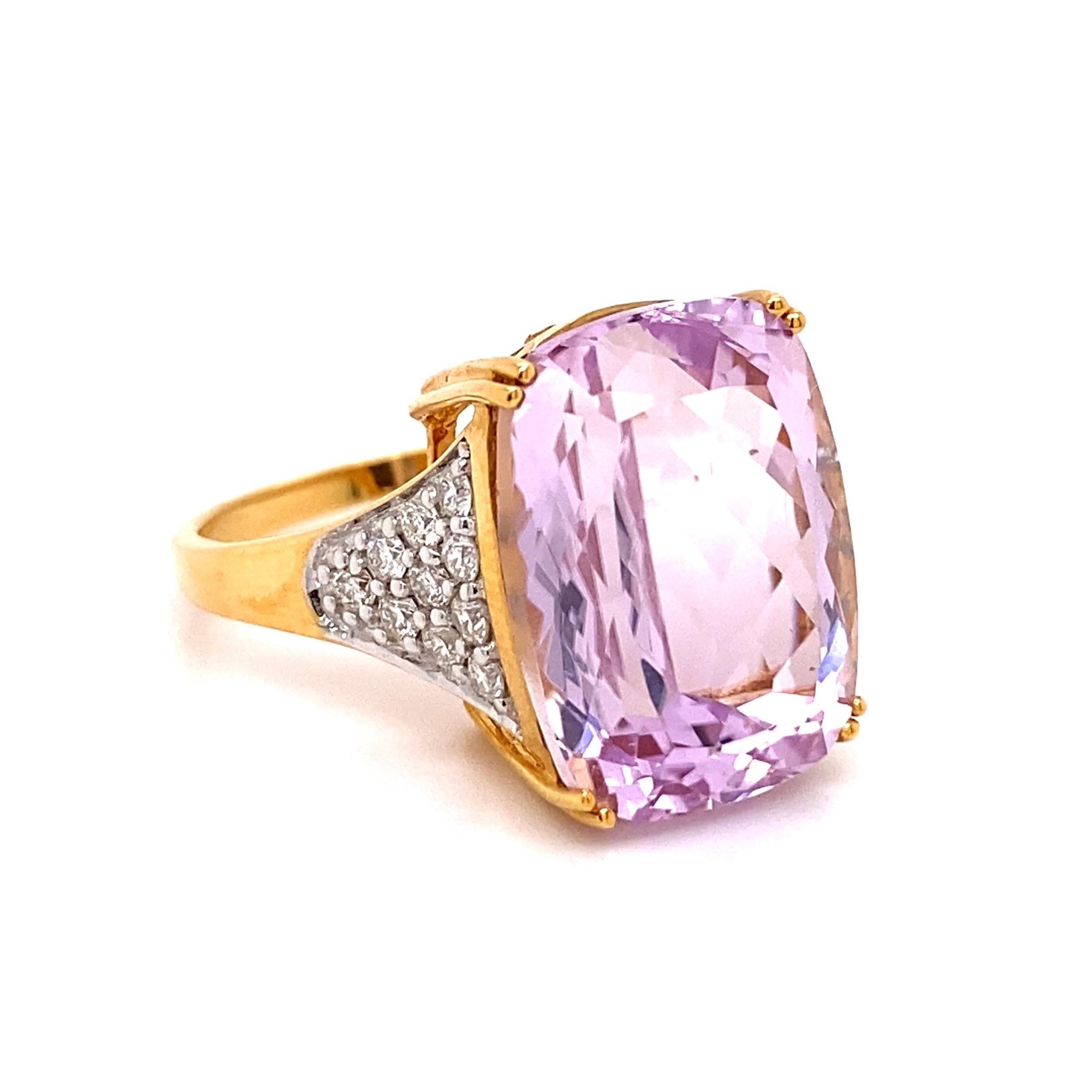 Simply Beautiful! Solitaire Cushion Kunzite and Diamond Gold Cocktail Ring. Centering a Hand set securely nestled 10.09 Carat Cushion Kunzite. Enhanced either side of shank with Diamonds, weighing approx. 0.40tcw. Hand crafted 18K Yellow Gold