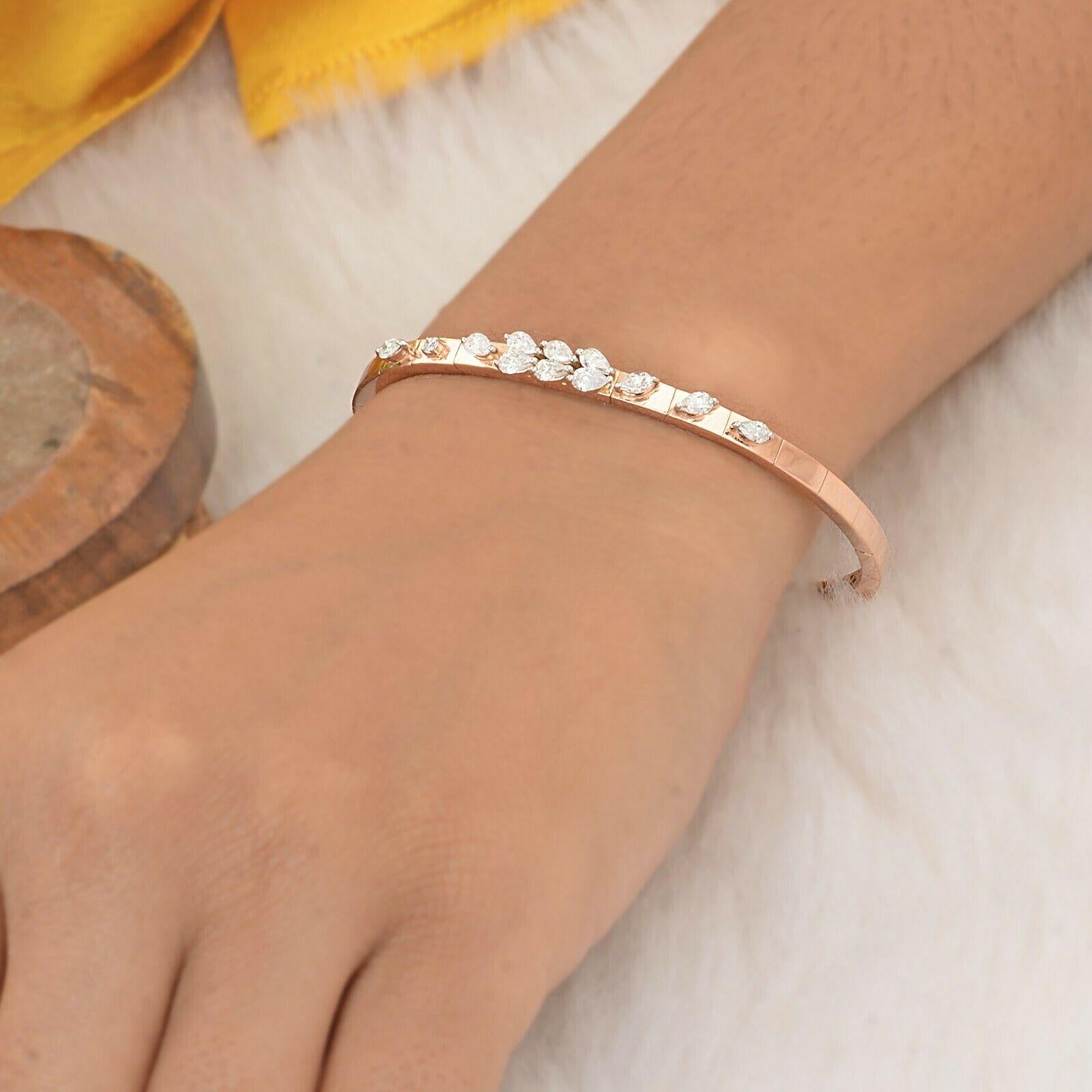 A bracelet handmade in 14K gold and hand set in 1.0 carats of sparkling diamonds. Wear it alone or stack it with your favorite pieces.

FOLLOW MEGHNA JEWELS storefront to view the latest collection & exclusive pieces. Meghna Jewels is proudly rated