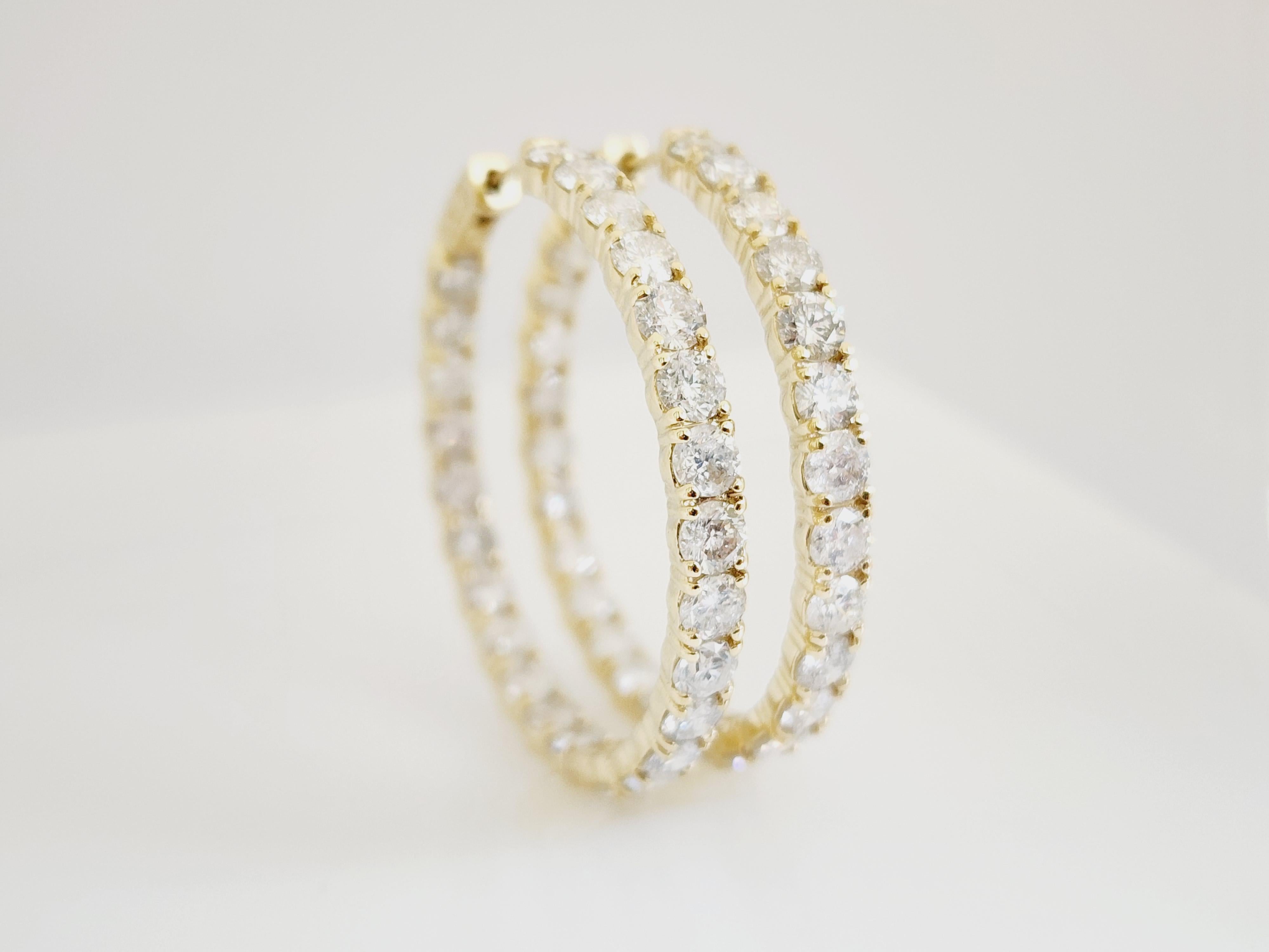 Beautiful pair of natural diamond inside out hoop earrings in 14K yellow gold. 
Secures with push down insert closure for easy wear. 
Average Color G, Clarity SI-I, 
Measures 1.50 inch x 1.50 inch. 