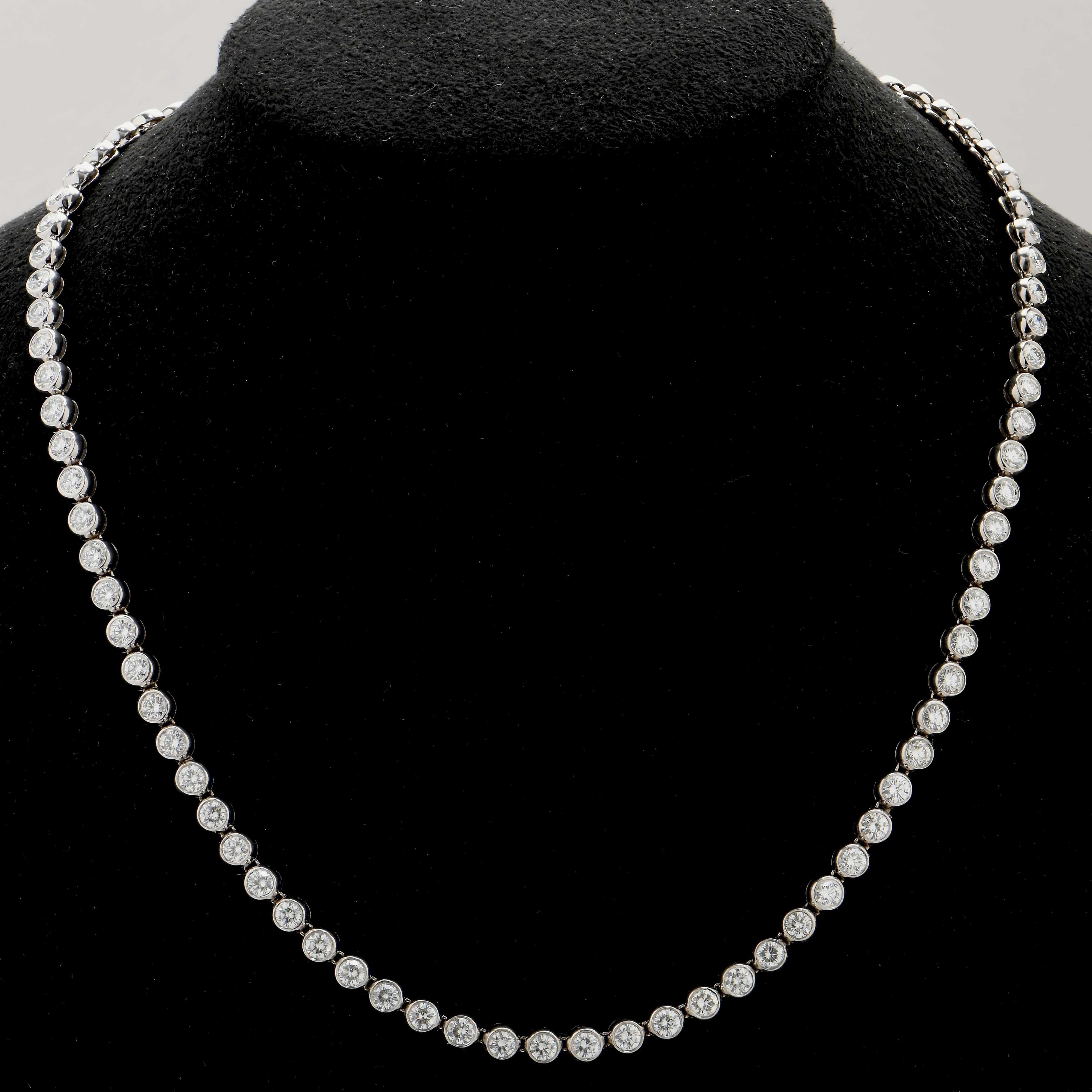 This beautiful Riviera necklace features 87 round brilliant cut diamonds with an estimated total weight of 10 carats of very well cut H color SI clarity diamonds.
16 inches in length.
Metal: 18 Karat White Gold
Weight: 29.4 Grams

