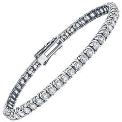 Bracelet tennis ligne en or blanc 18 carats avec tulipe brillante ronde et diamants de 10 carats