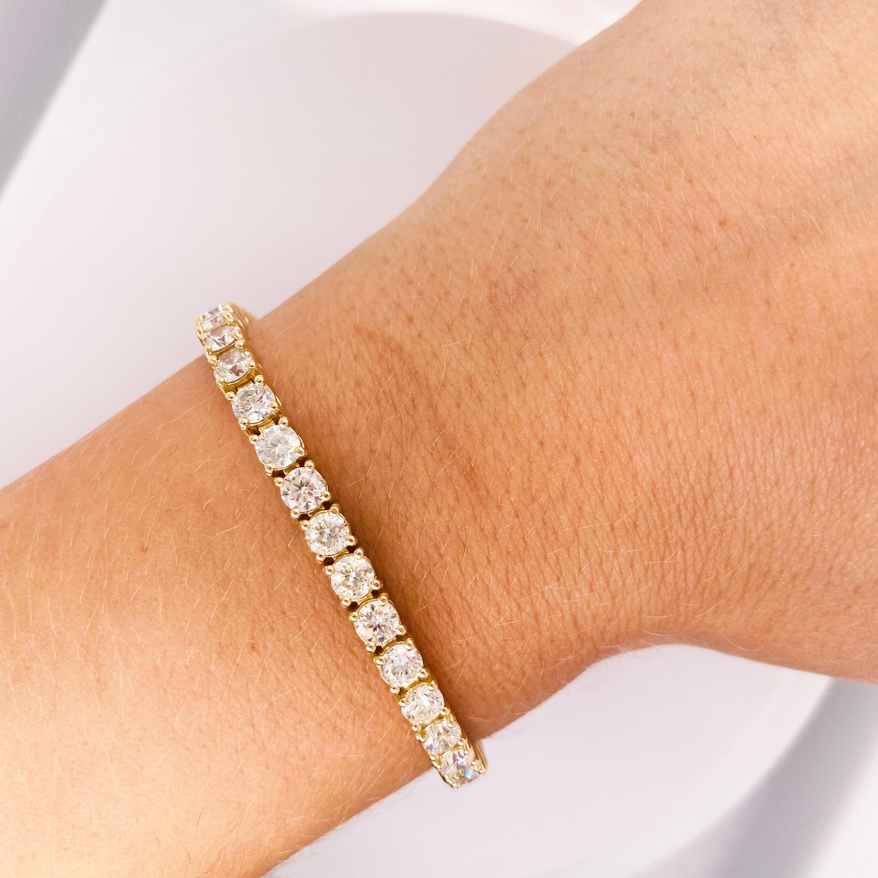 This 10 carat total weight 14K Yellow Gold TENNIS BRACELET is the perfect bracelet to go with your jewelry wardrobe. The huge diamonds are gorgeous quality, SI1 clarity and H/I color. You will love, love this bracelet!
