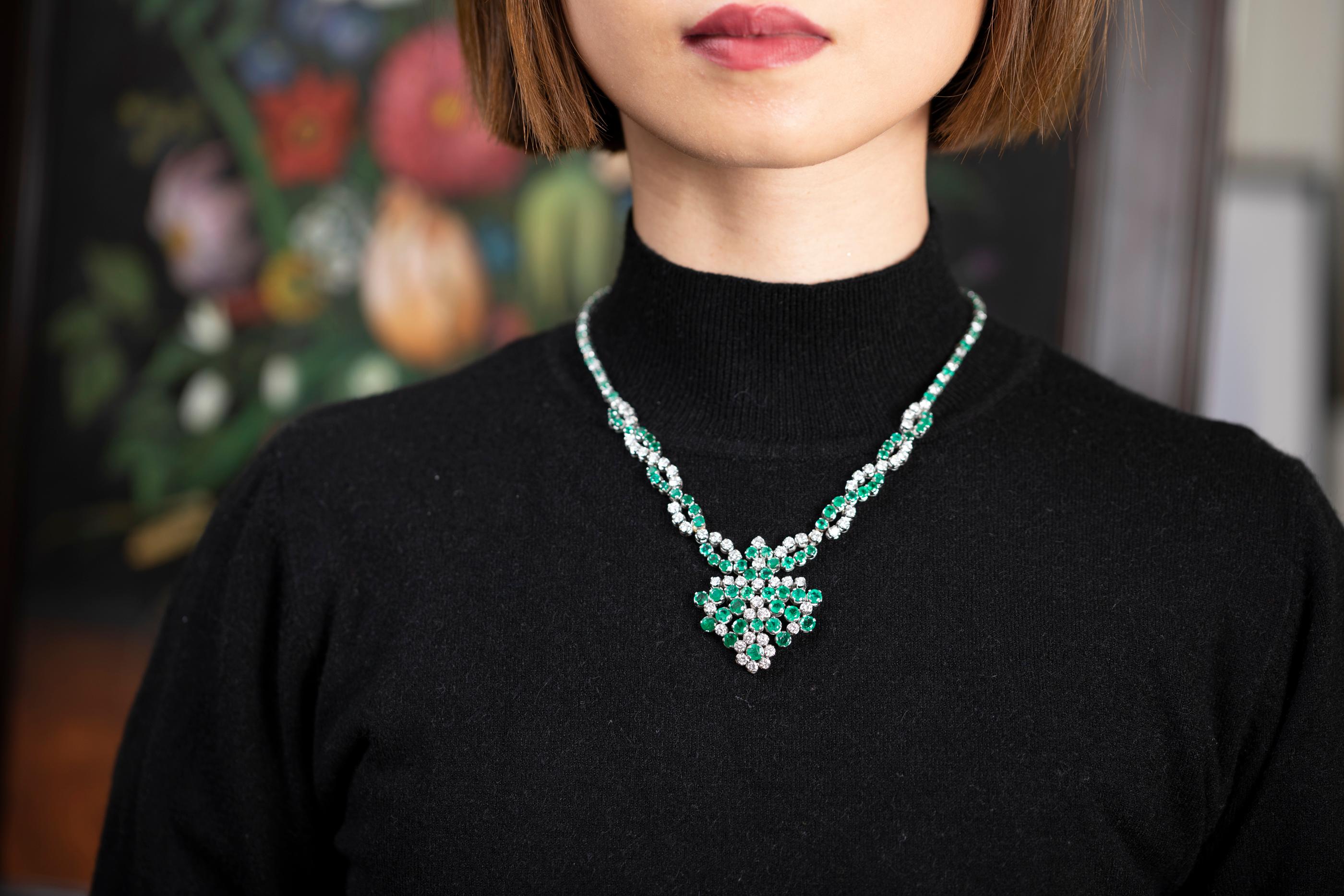 10 Carats Diamonds and 12 Carats Emeralds Necklace   

Very beautiful necklace, made in France circa 1980. 
The Design is elegant, the workmanship is quality. 
Made with white gold 18k. Mark for gold 18k (the eagle). 
The round diamonds are good