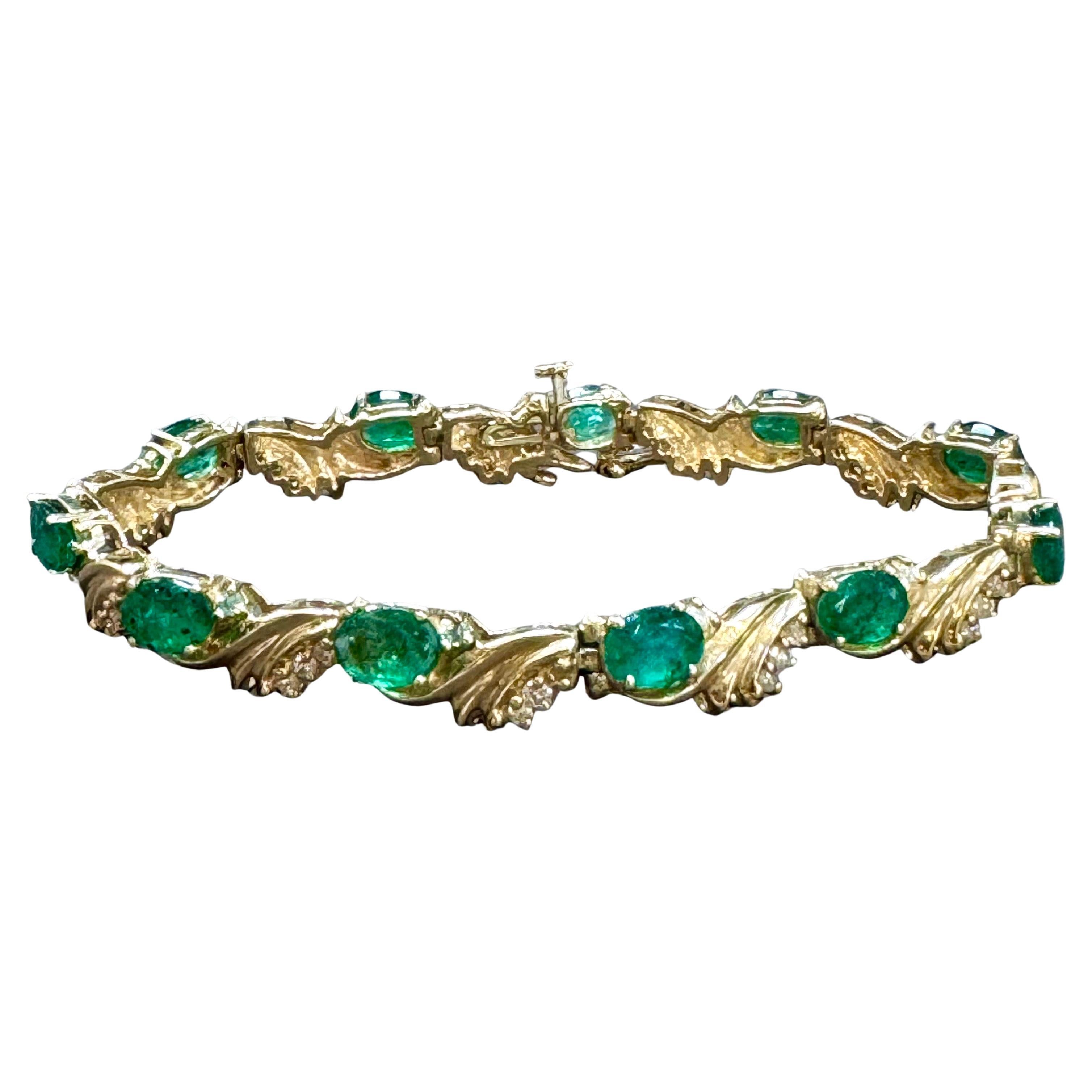  This exceptionally affordable Tennis  bracelet has  11 large natural stones of oval  Emeralds  . Each Emerald is spaced by a gold cone shape design which has three brilliant cut diamonds . Total weight of the Emeralds is approximately 10 carat.