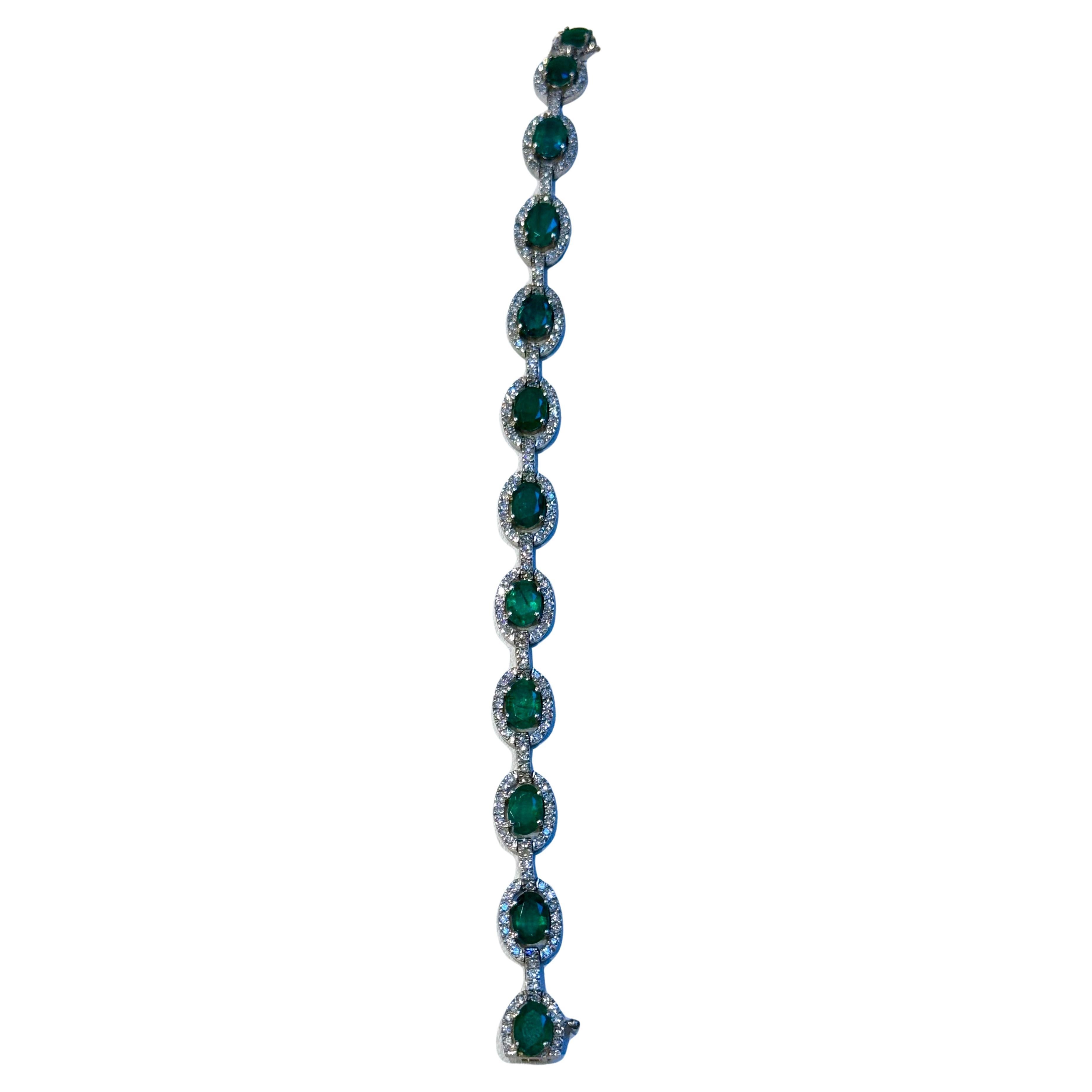  This exceptionally affordable Tennis  bracelet has  12 stones of oval  Emeralds  . Each Emerald is 
 surrounded by brilliant cut diamonds .Total weight of Emerald is approximately 10 carat.  diamond weighs is approximately 3 ct.
These are all