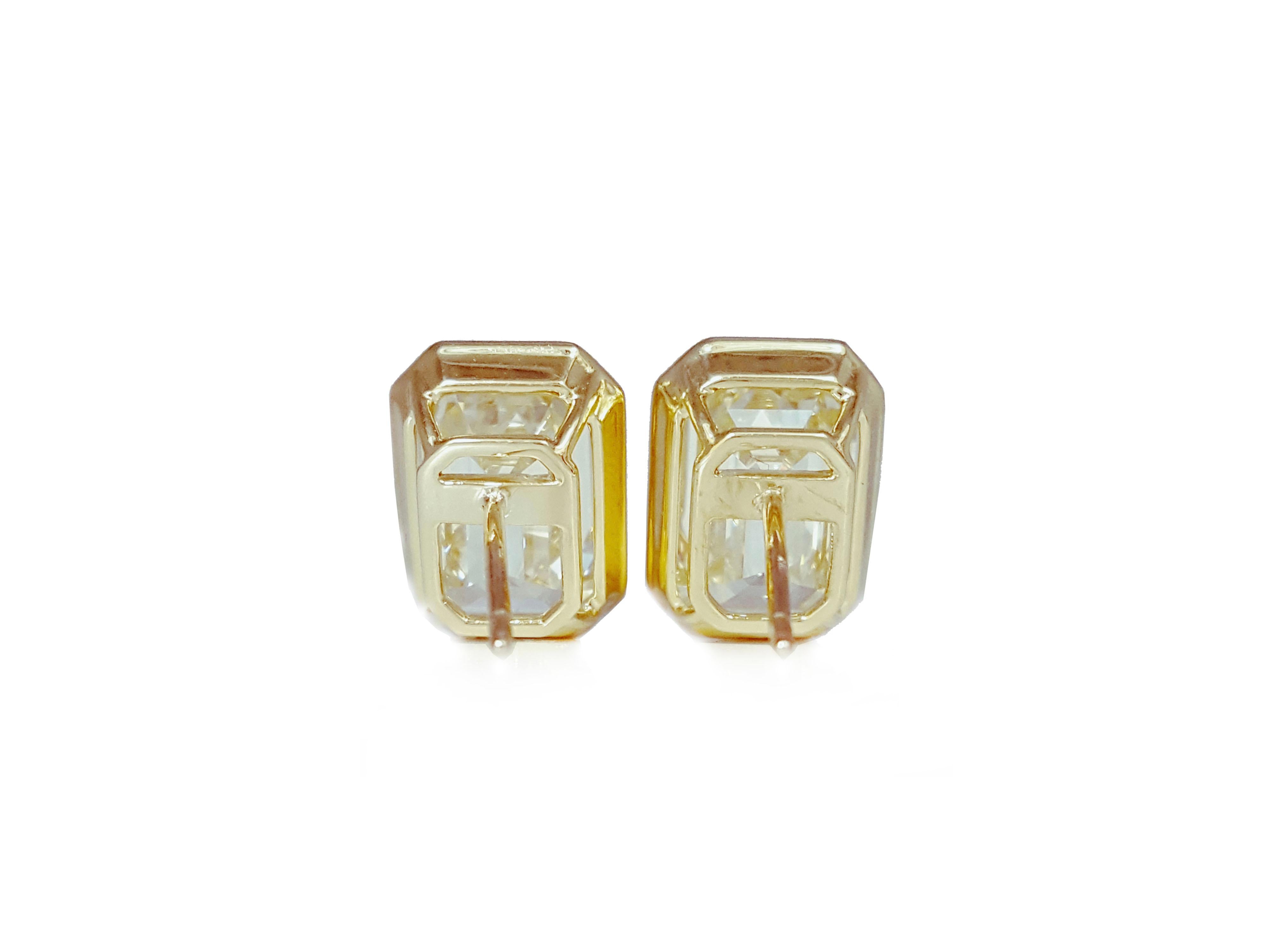 Pendientes de diamantes talla esmeralda de 10 quilates engastados en bisel de oro de 18 quilates, certificados por el GIA Art Decó