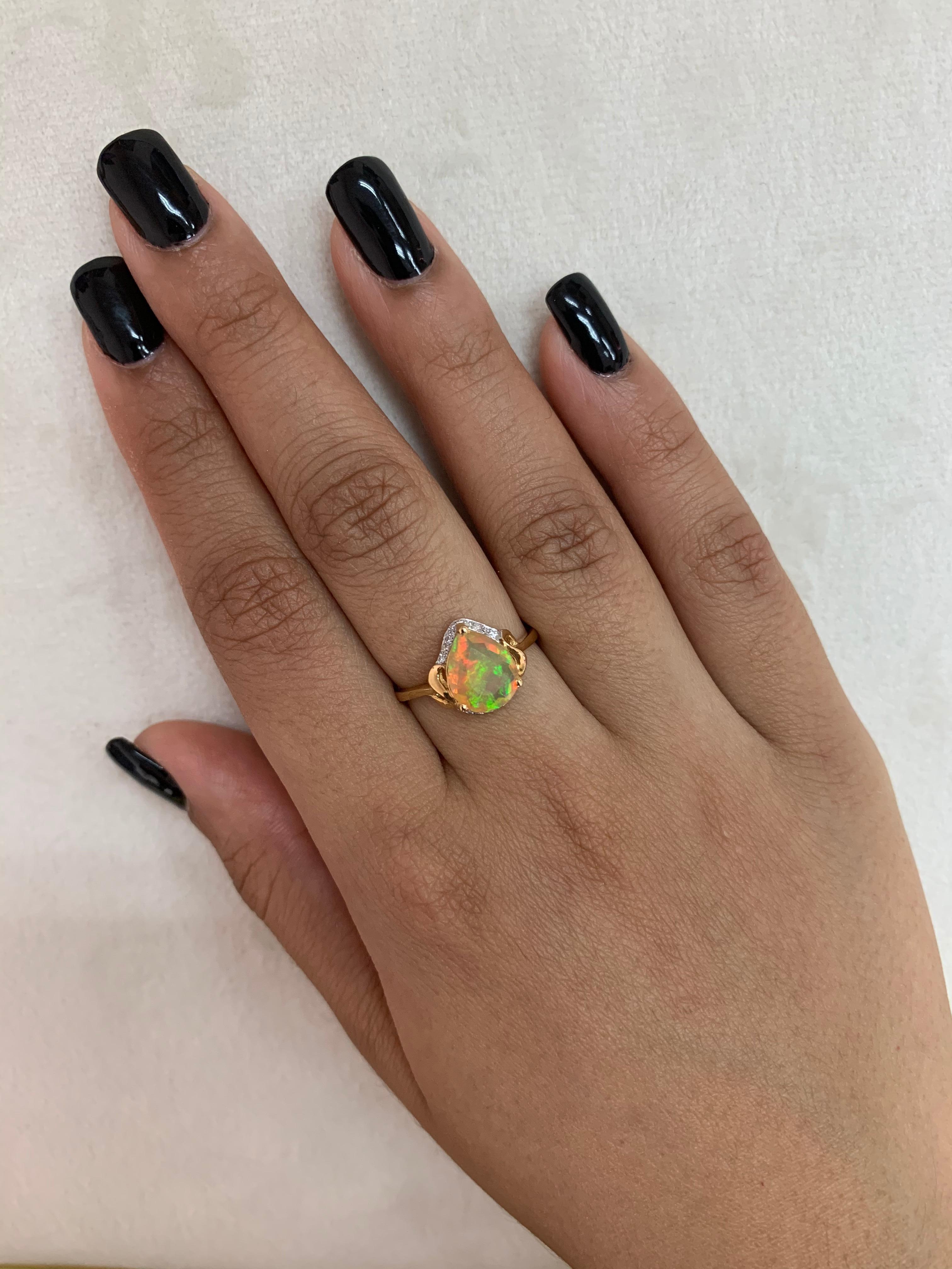 Pear Cut Sunita Nahata Ethiopian Opal 1.00ct. Fancy Ring in 18K Yellow Gold with Diamond For Sale