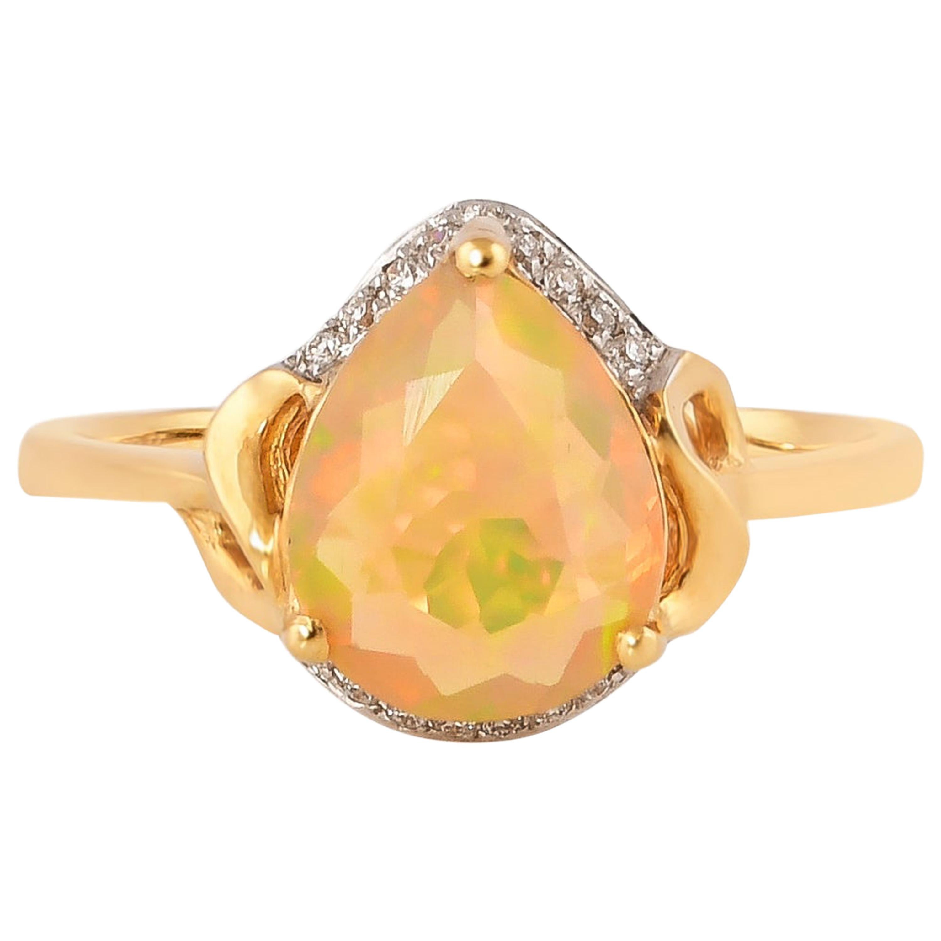 1.0 Carat Ethiopian Opal with Diamond Ring in 18 Karat Yellow Gold