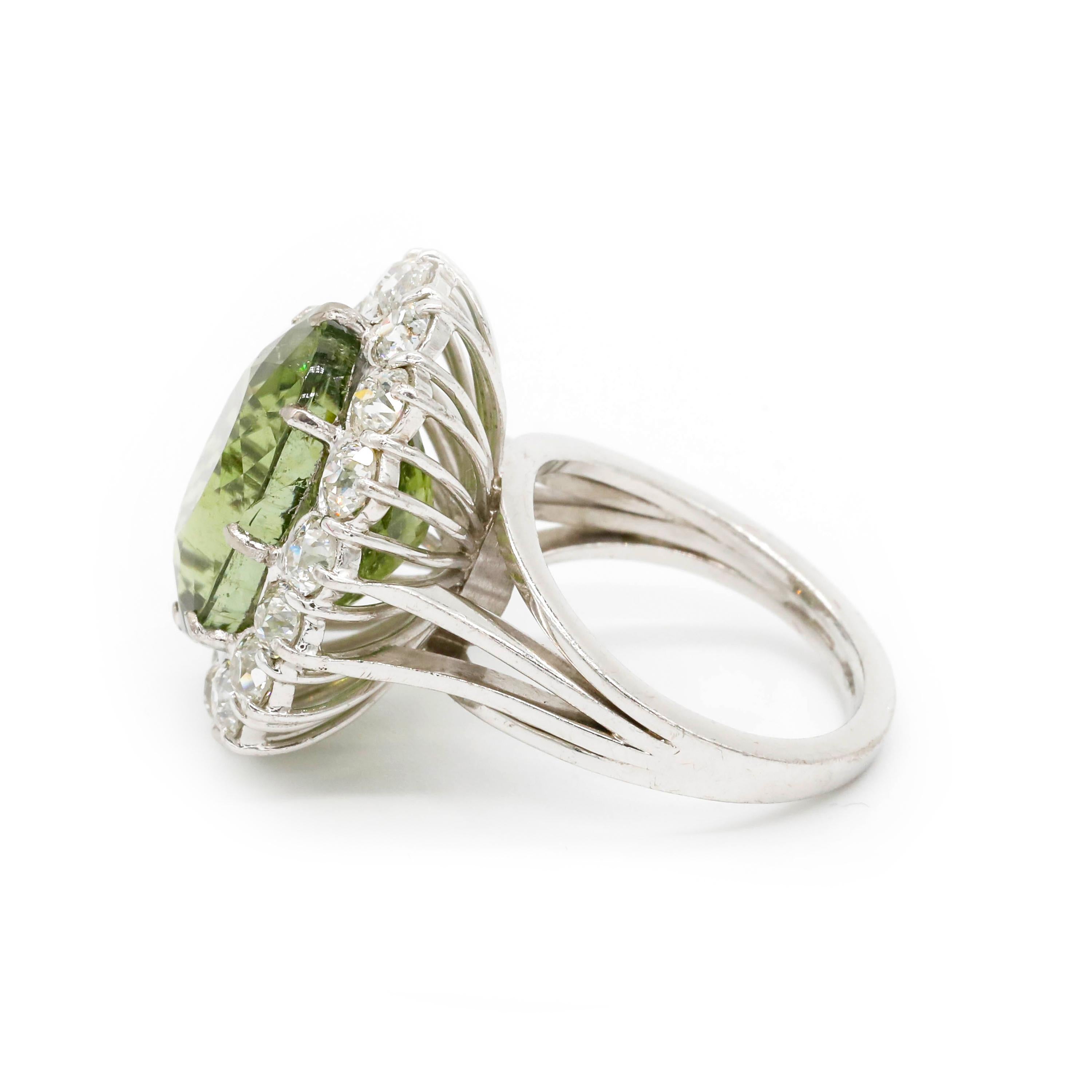 10 Carat Green Tourmaline and Diamond Ring Platinum Solitaire Cocktail Ring

This modern ring features a total of 1.90 carats of diamond round shape and 10.00 carats Green Tourmaline Gemstone Set in Platinum.

We guarantee all products sold and our