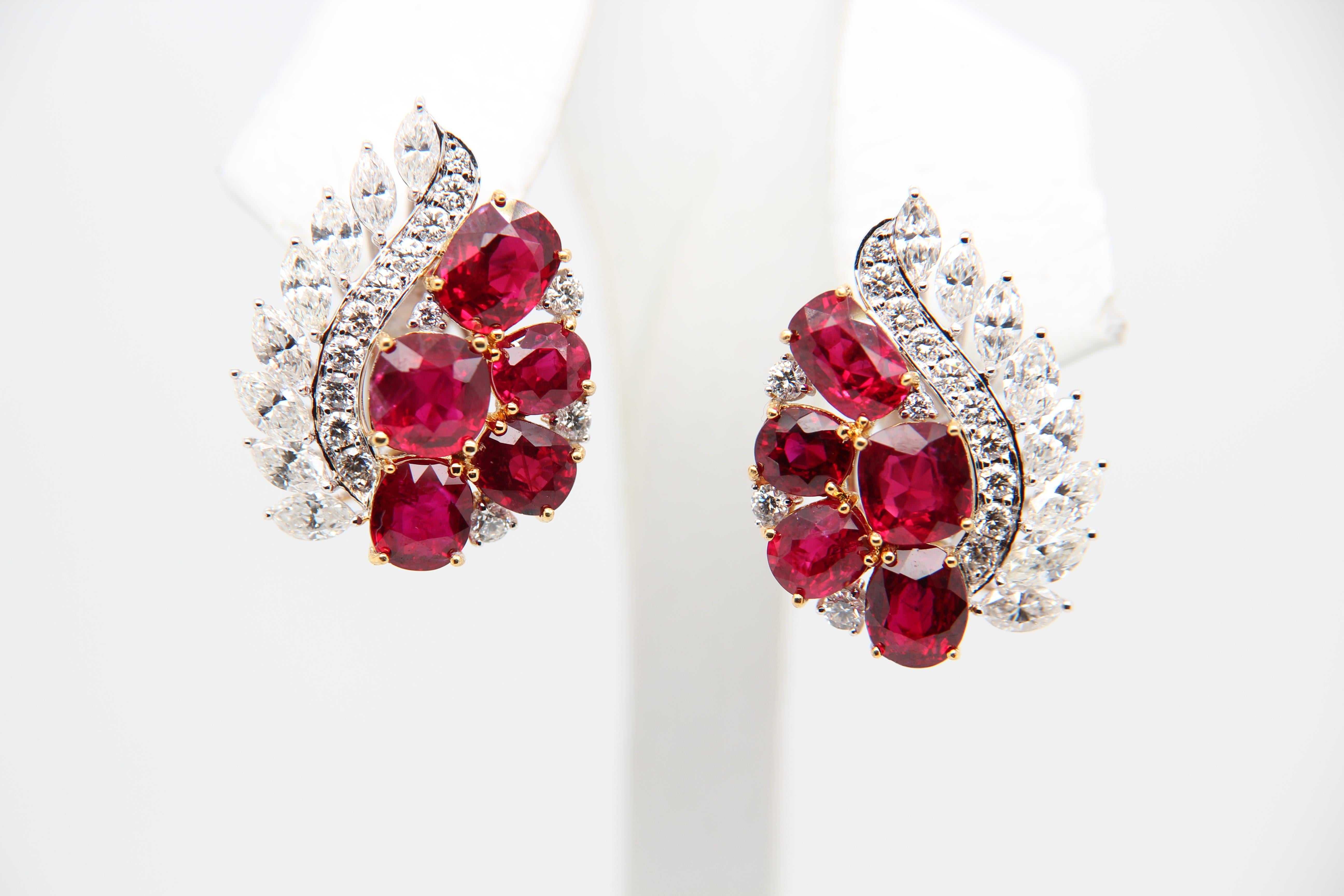 A modern ruby earring made with a carefully curated collection ten rubies that have been certified 'Pigeon's Blood' Gubelin Gem Lab, weighing at a total of 10 carats.  The mounting has been made with 18 karat white gold and a mixture of round and