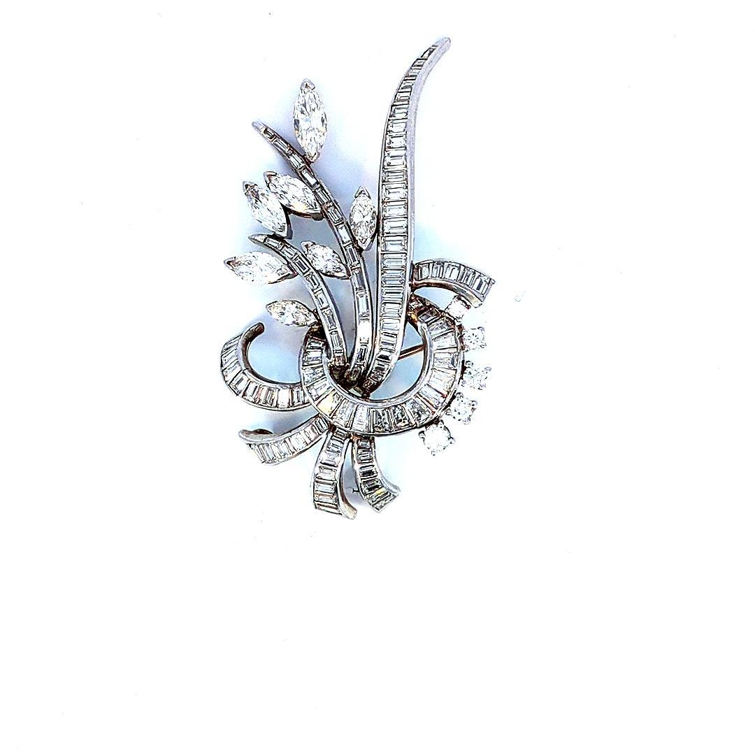 Discover the epitome of opulence with our 10 Carat Natural Diamond Pin, meticulously crafted in 20.28 grams of white gold and platinum. This radiant masterpiece showcases a dazzling array of natural diamonds totaling an impressive 10 carats,
