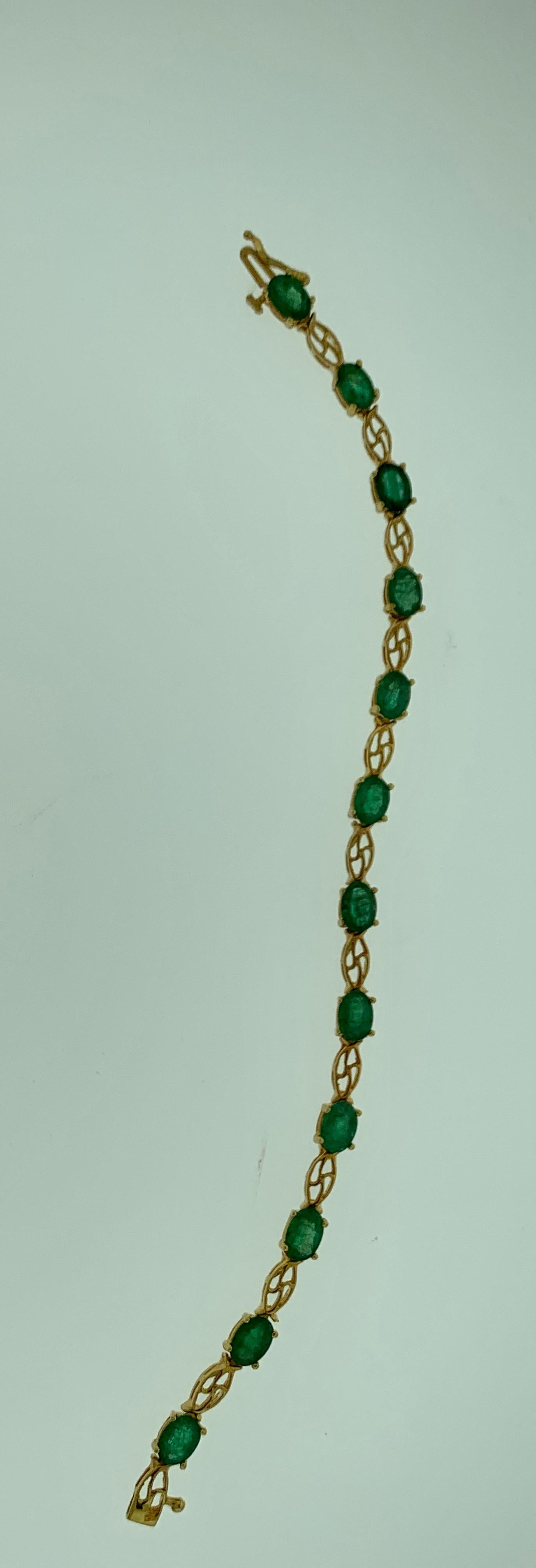 Oval Cut 10 Carat Natural Emerald Tennis Bracelet 14 Karat Yellow Gold