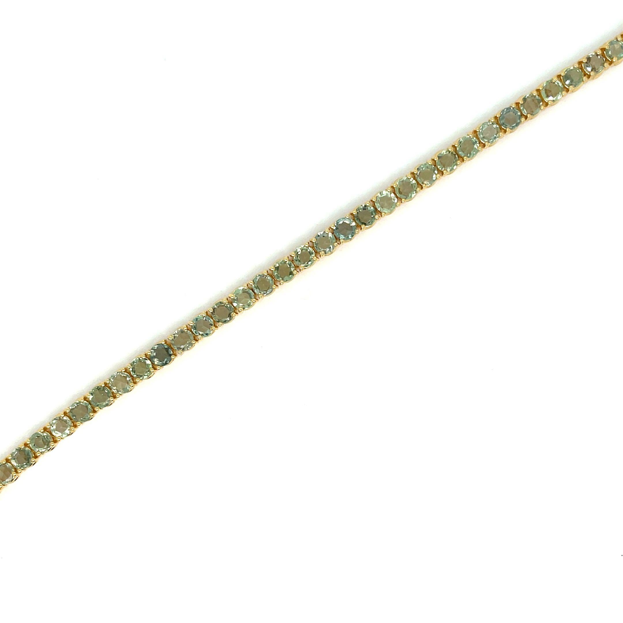 Fabulous important brand new bracelet made in solid 9 kt yellow gold and set with 9,80 Carats of rose cut vivid Natural Green Sapphires, weighing 0.21 carat each (3,5 mm).
This piece is designed and crafted in our laboratories, thanks to old