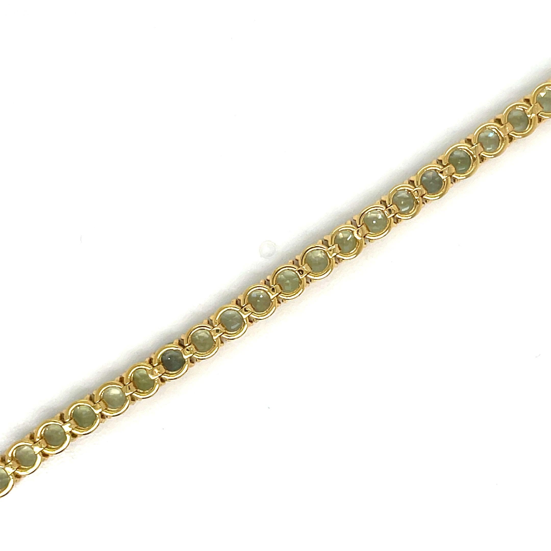 Modern 10 Carat Natural Green Sapphire Yellow Gold Tennis Bracelet For Sale