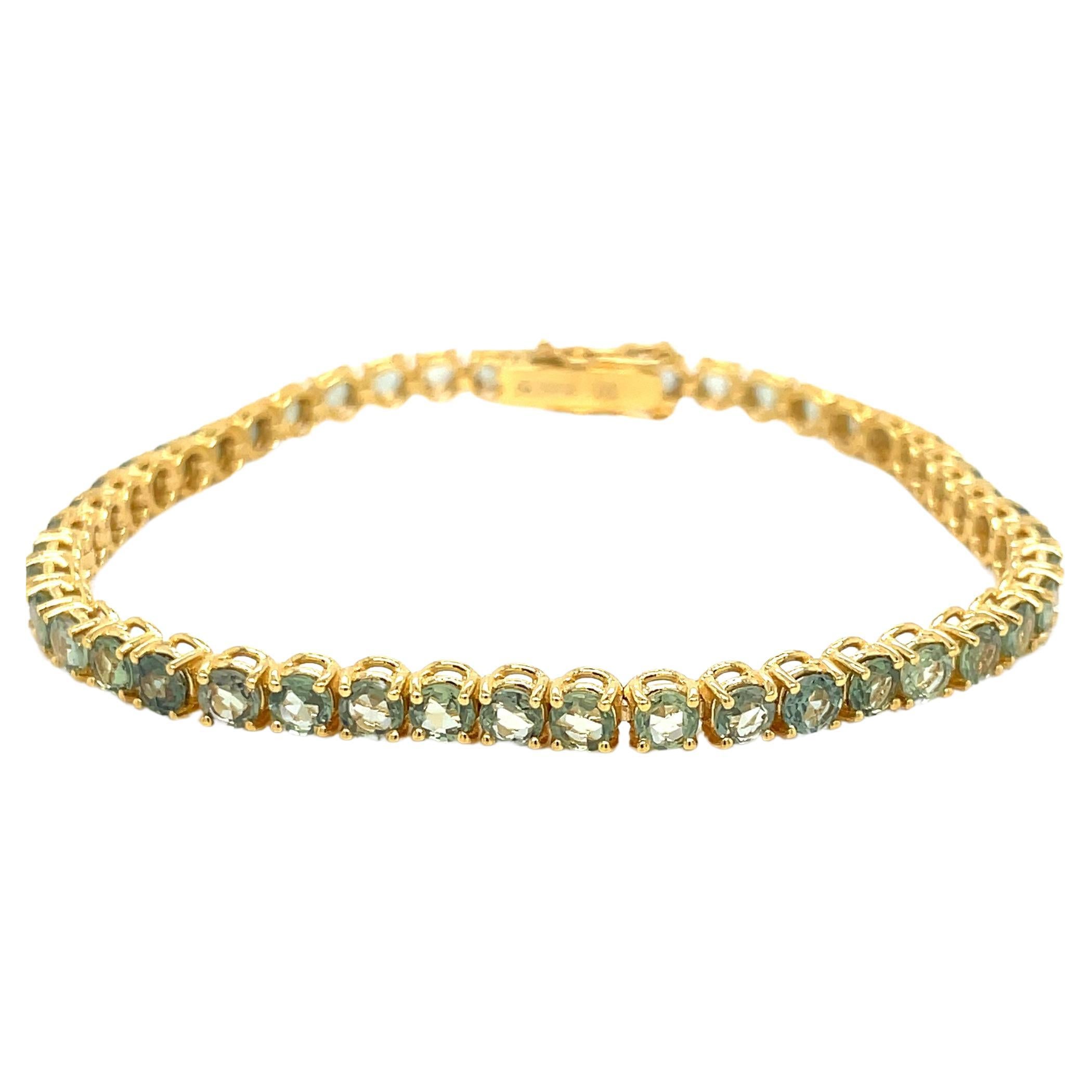 Bracelet tennis en or jaune avec saphir vert naturel de 10 carats