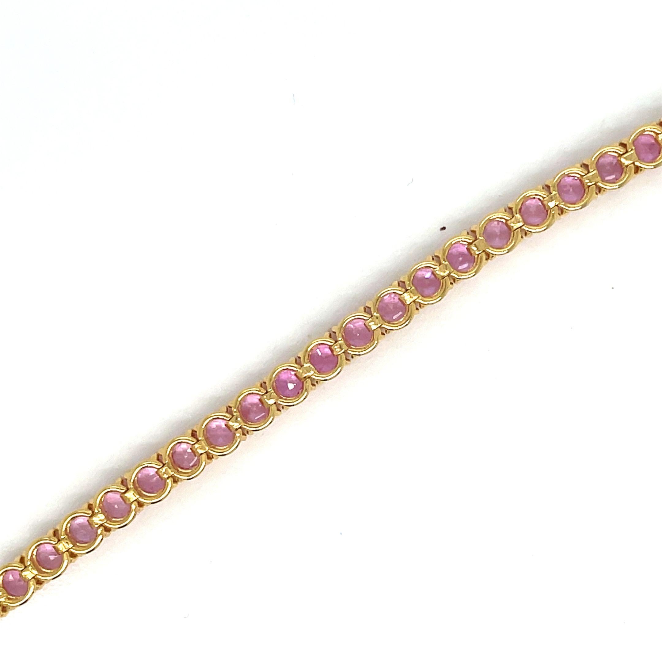 Modern 10 Carat Natural Pink Sapphire Yellow Gold Tennis Bracelet For Sale