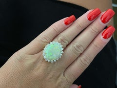 Anello aureola con opale da 10 carati e diamante da 2 carati in oro giallo 14k