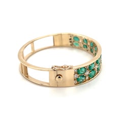 10 Carat Oval Cut Emerald and Diamond 2-Row Bangle in 14k Yellow Gold