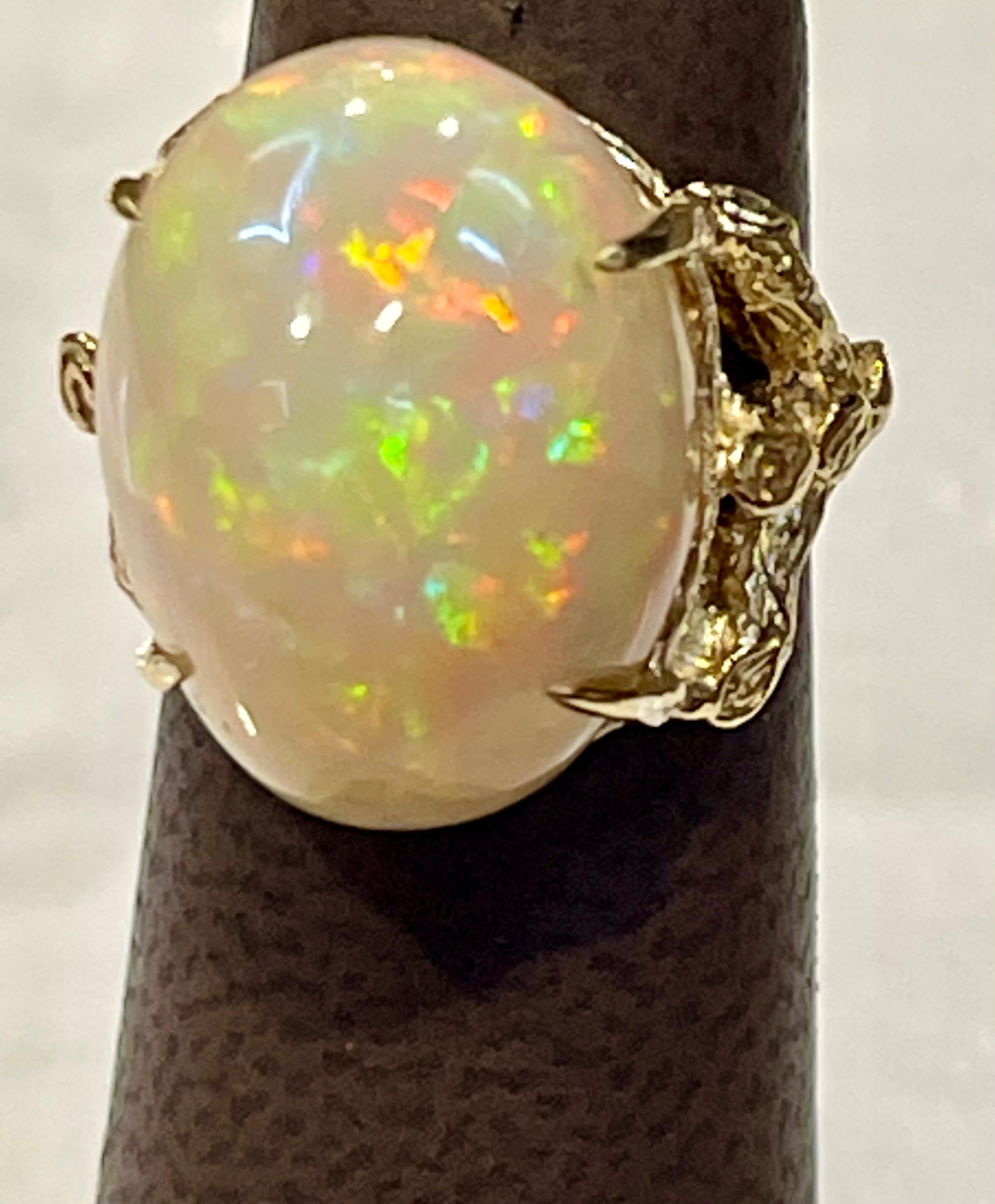 10 Carat Oval Shape Ethiopian Opal Cocktail Ring 14 Karat Yellow Gold For Sale 3