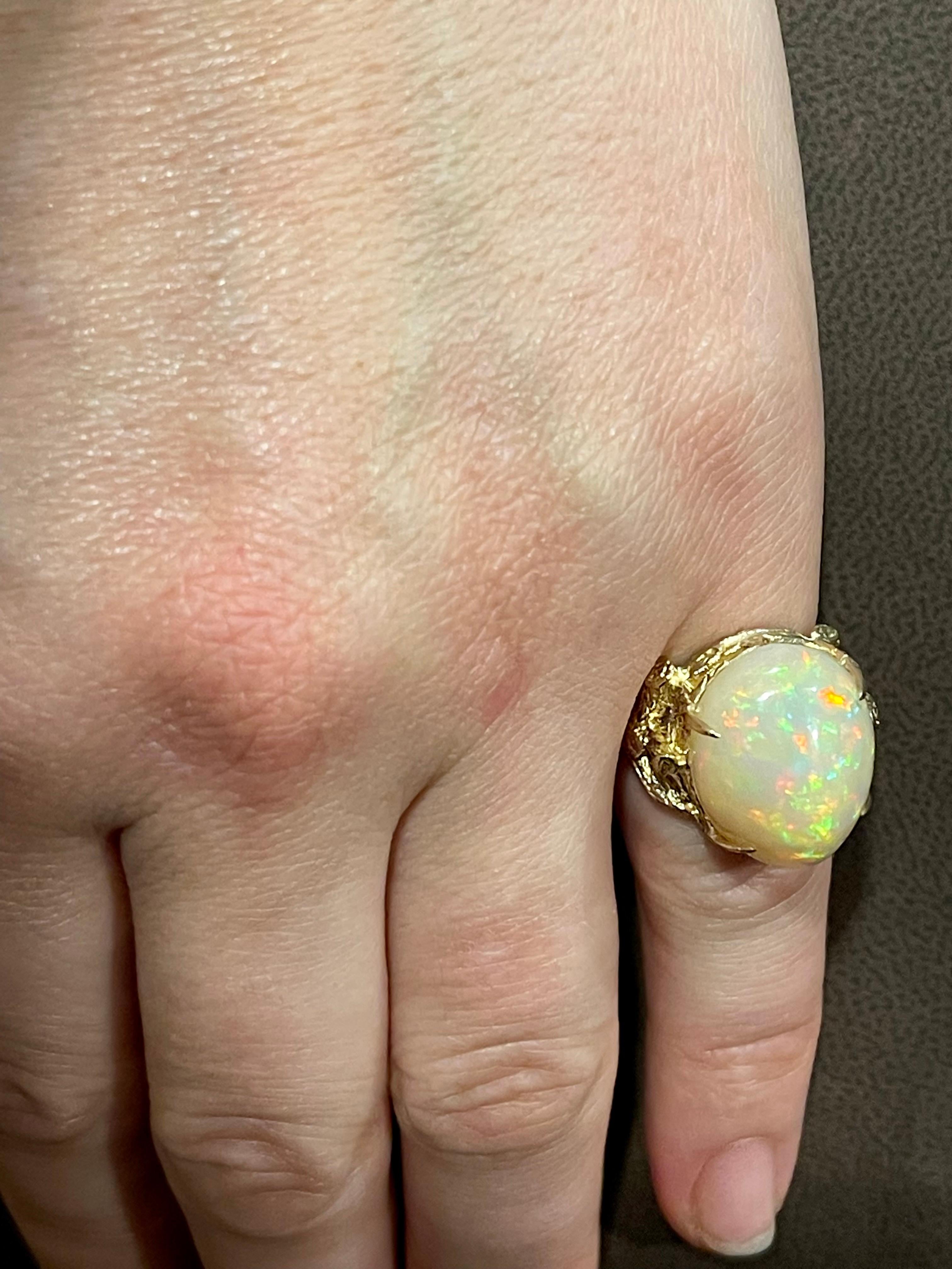 10 Carat Oval Shape Ethiopian Opal Cocktail Ring 14 Karat Yellow Gold For Sale 8