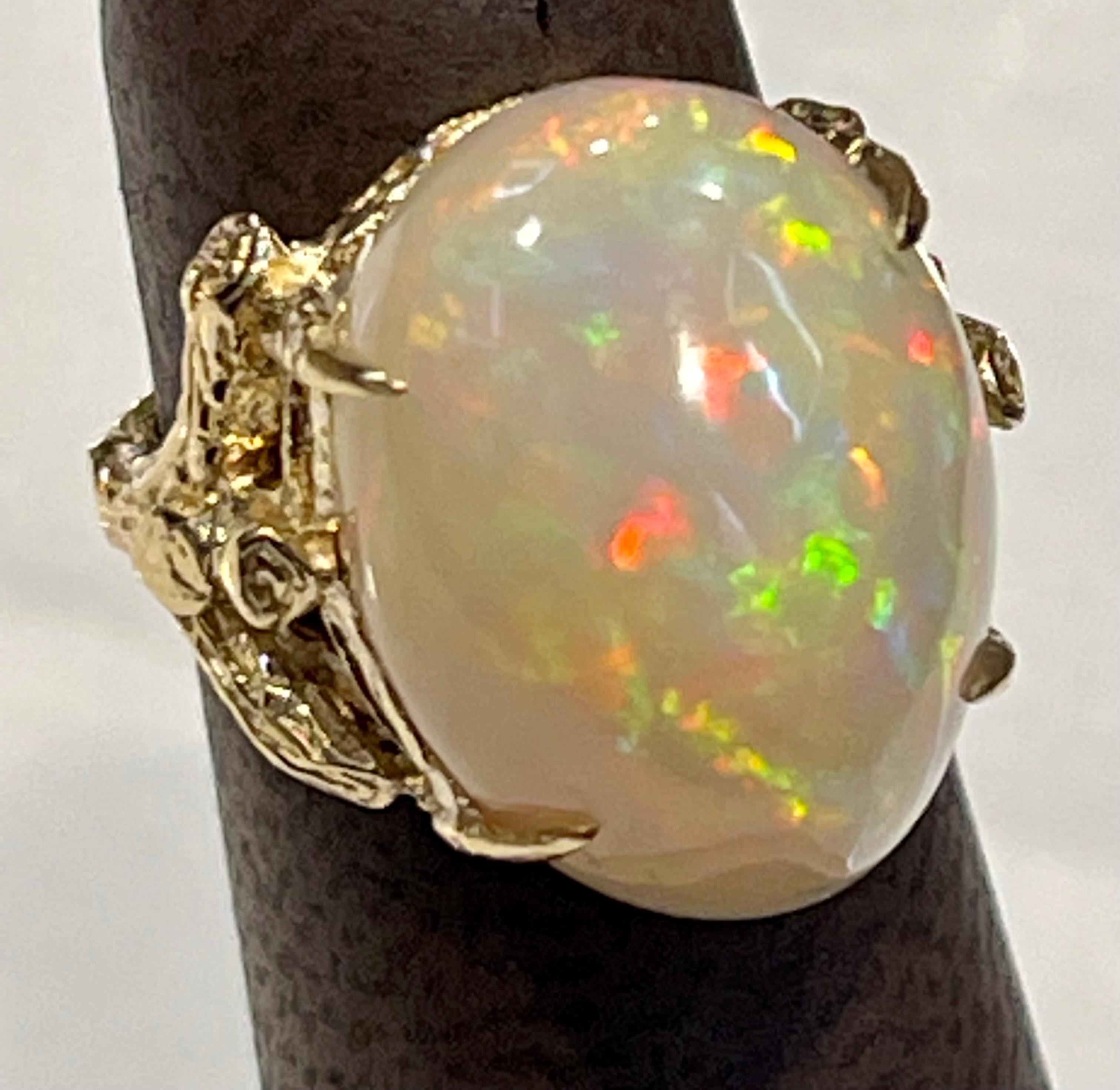 10 Carat Oval Shape Ethiopian Opal Cocktail Ring 14 Karat Yellow Gold For Sale 2