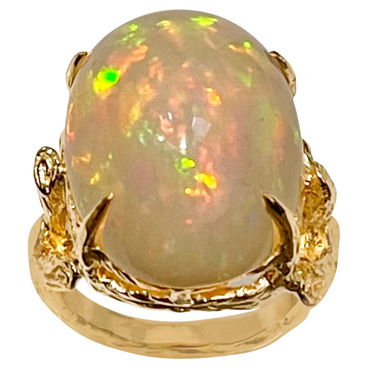10 Carat Oval Shape Ethiopian Opal Cocktail Ring 14 Karat Yellow Gold For Sale