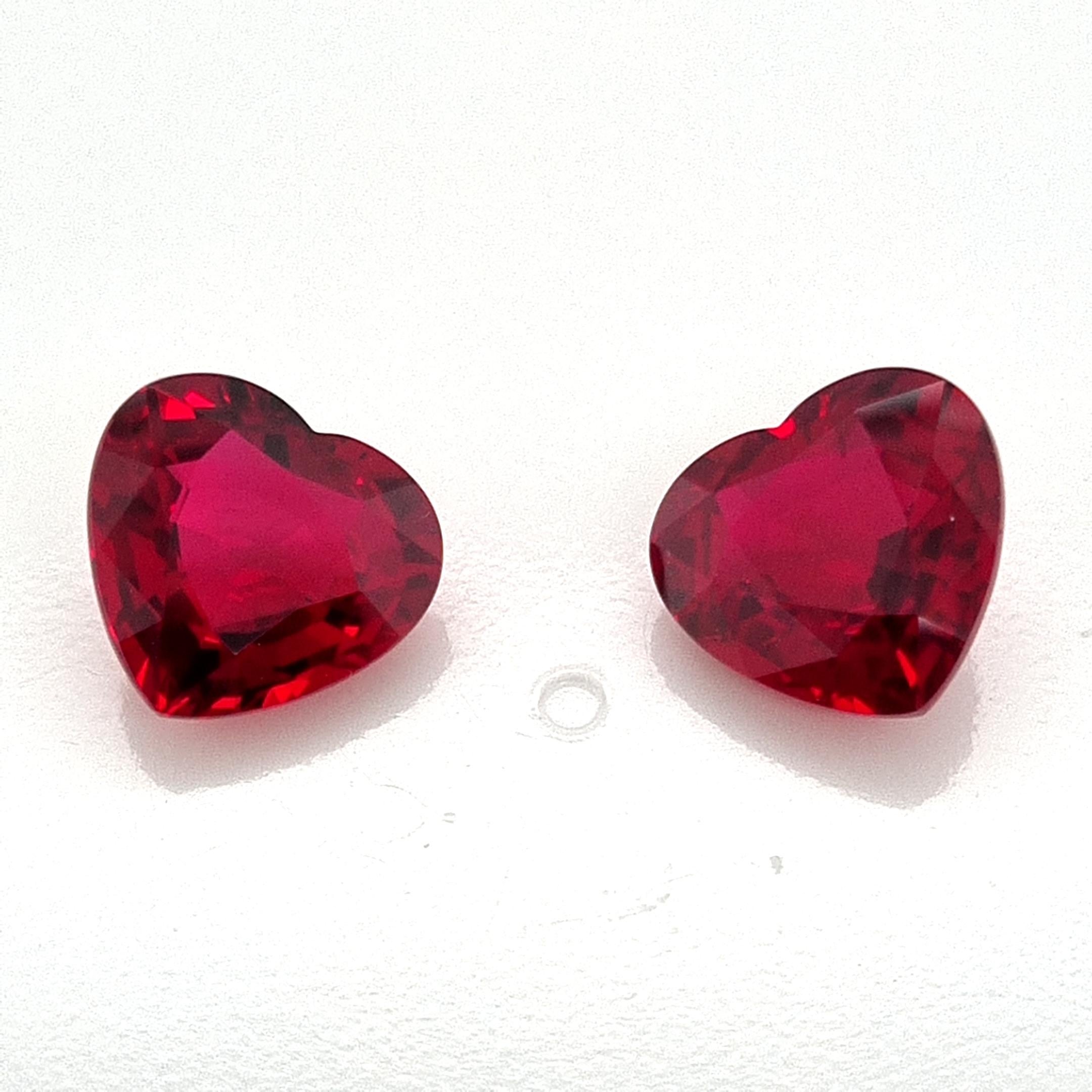 This 10 carat Pair of Heated Heartshape Pigeons Blood Rubies are truly an exception to the norm. If you are looking to standout, look no further. 

Each Ruby weighs in excess of 5 carats and boasts a number of magnificent character traits. 

The