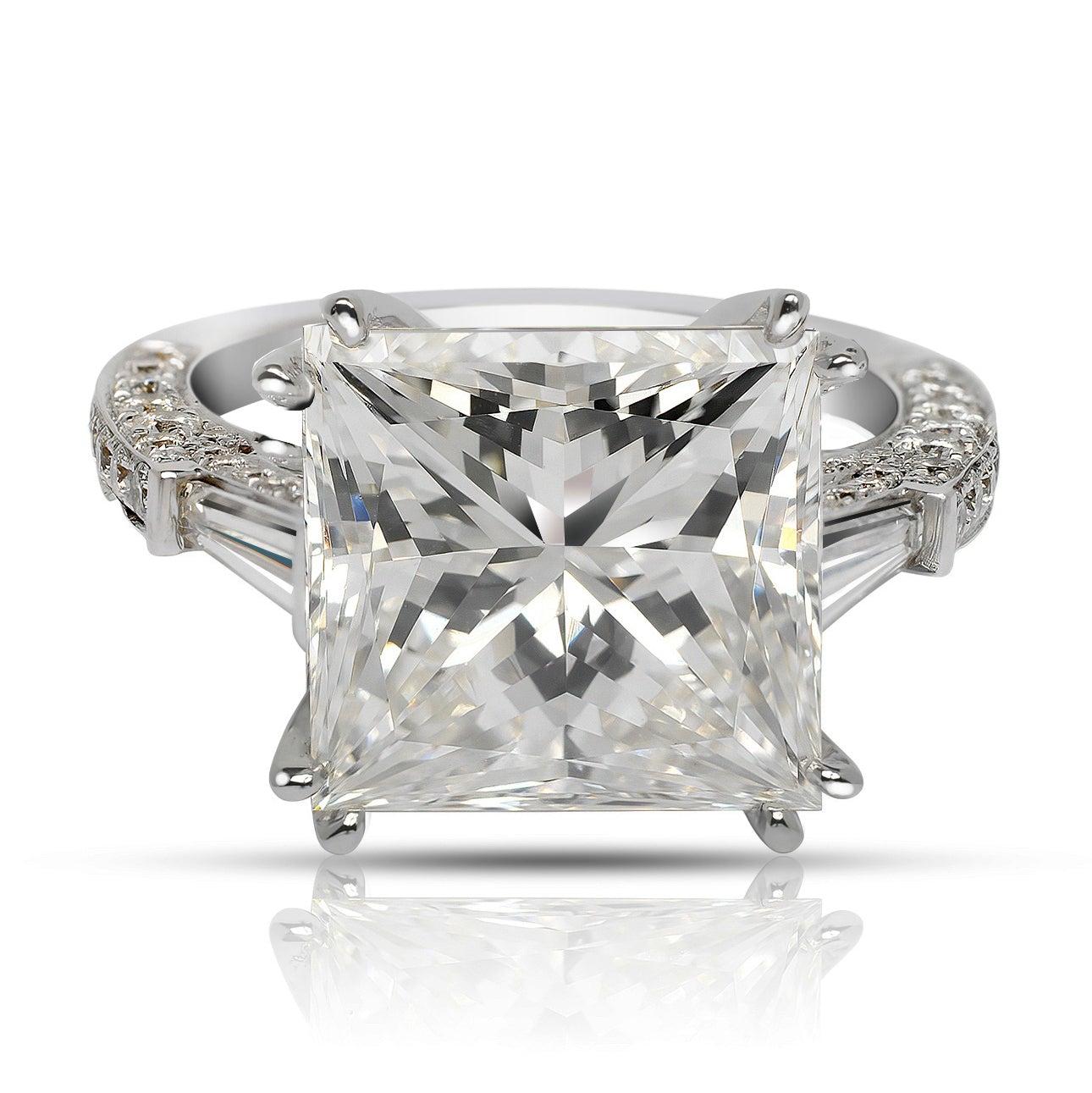 SKYLAR DIAMOND ENGAGEMENT PLATINUM RING BY MIKE NEKTA

GIA CERTIFIED
Center Diamond:
Carat Weight: 8.2 Carats
Color: J
Clarity: VS2
Style:  PRINCESS - SQUARE MODIFIED BRILLIANT
Approximate Measurements: 11.4 x 11 x 7.9 mm

Ring:
Metal: 18K WHITE