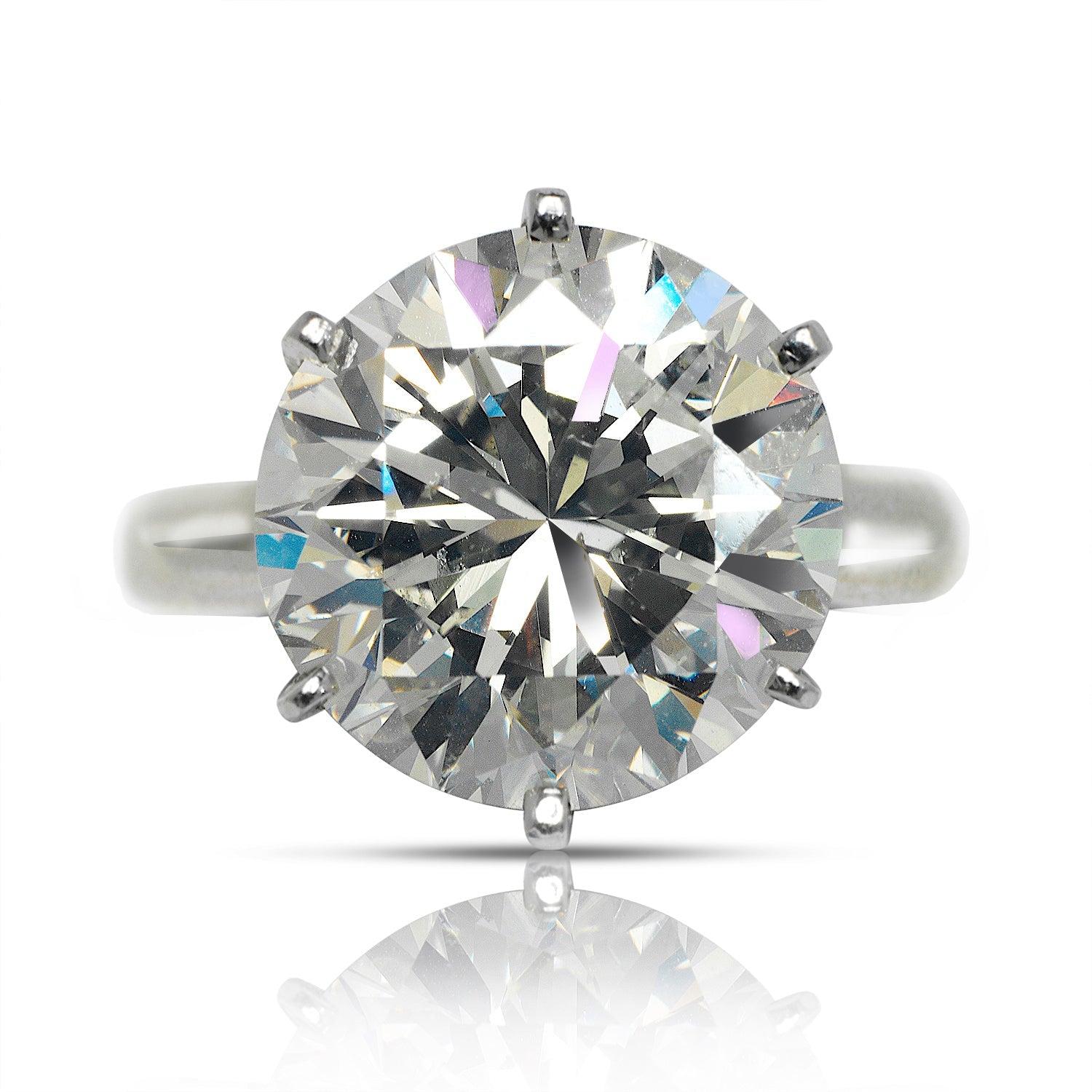 YANA ROUND CUT DIAMOND ENGAGEMENT RING 14K WHITE GOLD BY MIKE NEKTA

Center Diamond
Carat Weight: 10 Carats
Color:  I
Clarity: VS2
Style:  ROUND BRILLIANT 
Measurements:  13.1 x 13.5 x 8.8 mm

Ring:
Metal: 14K WHITE GOLD 
Metal Weight: 9 GR
Style: