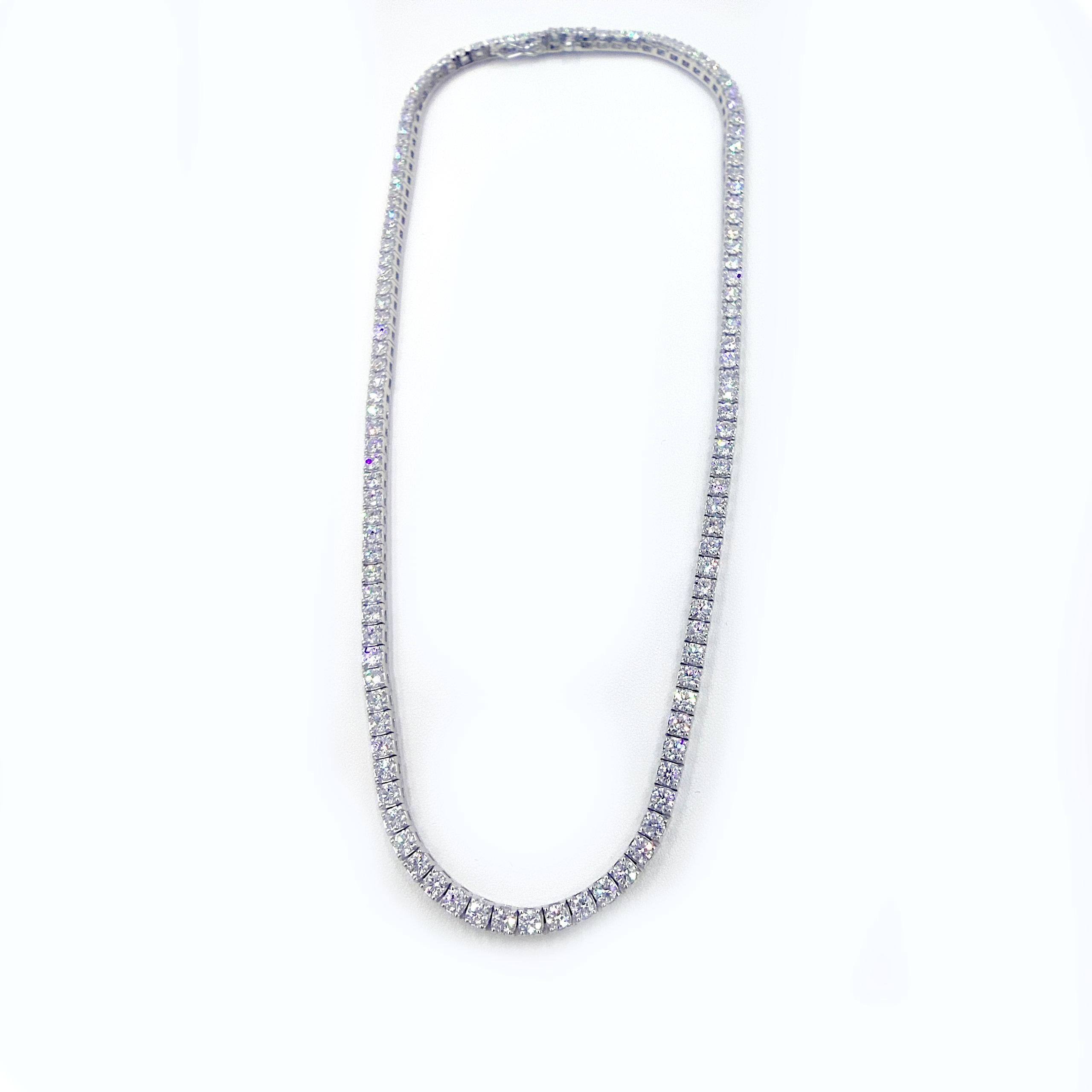Exquisite 10 Carat Round Diamond Tennis Necklace

Elevate your jewelry collection with this stunning 16-inch tennis necklace, crafted to showcase the timeless elegance of round diamonds. Totaling 10 carats, each diamond is meticulously set to create