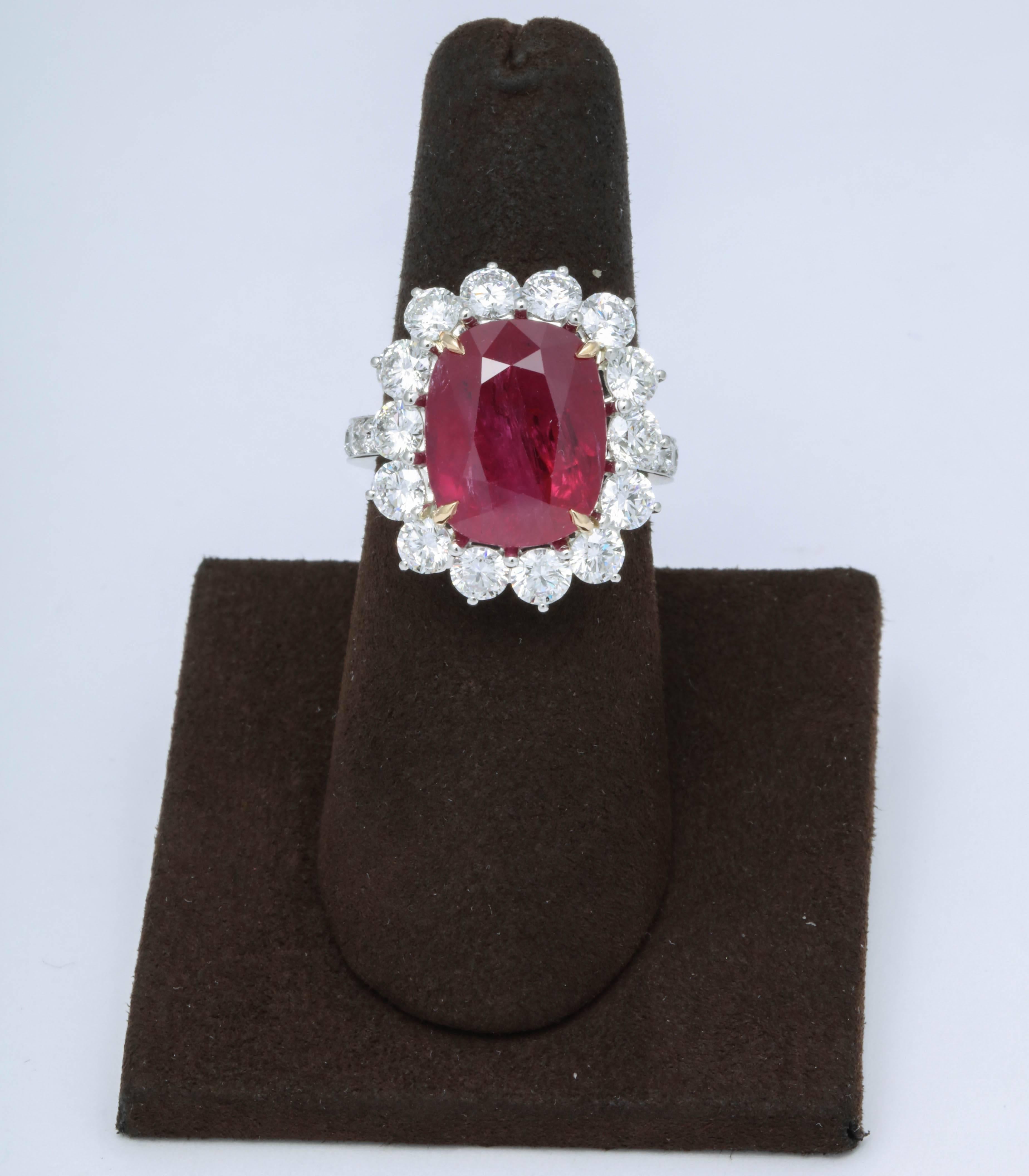 A FABULOUS Ruby and Diamond Cocktail Ring

This ring features a beautiful Cushion cut 