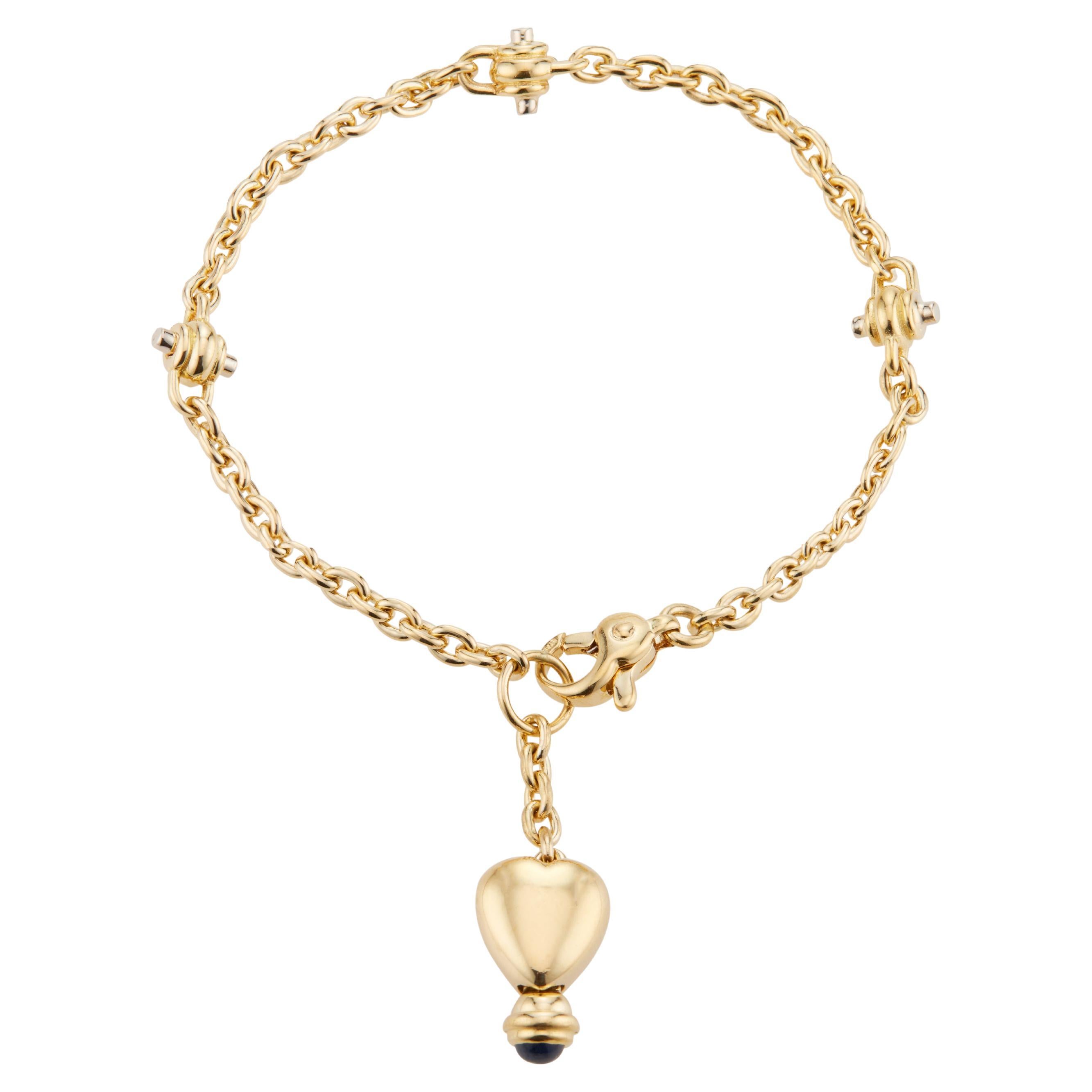 Bracelet à maillons en forme de cœur en or jaune avec saphir de 0,10 carat en vente
