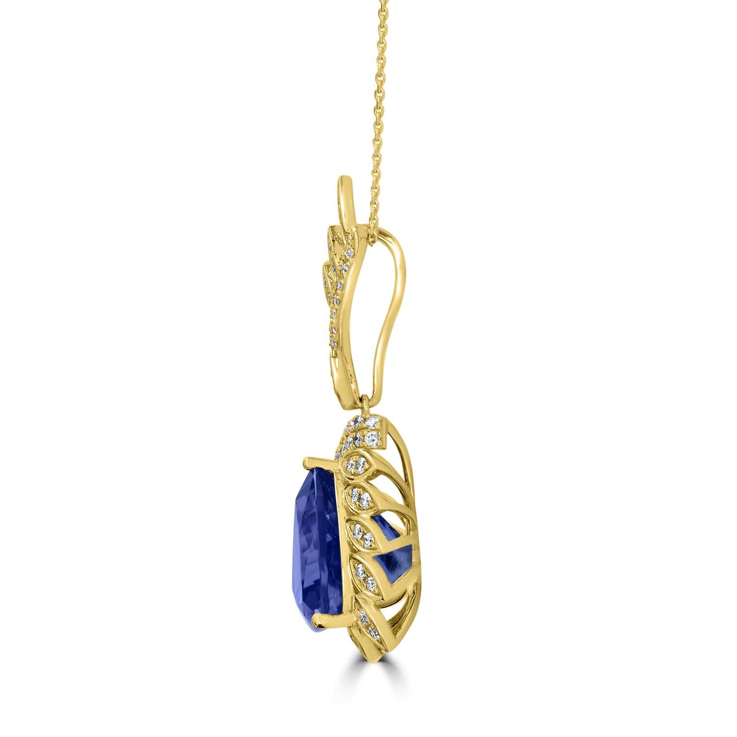 This 10.55 carat Tanzanite pendant with 0.53 total carats of diamonds set in 18K yellow gold is a truly remarkable piece of jewelry. The tanzanite gemstone is a stunning shade of blue-violet that is both striking and elegant. It is perfectly