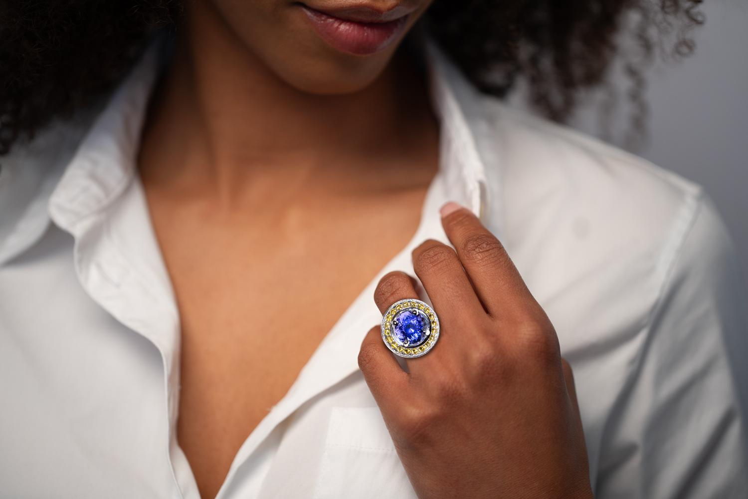 Artisan 10 Carat Tanzanite Cocktail Ring in 18K WG with Yellow Sapphires & Diamond Halo For Sale