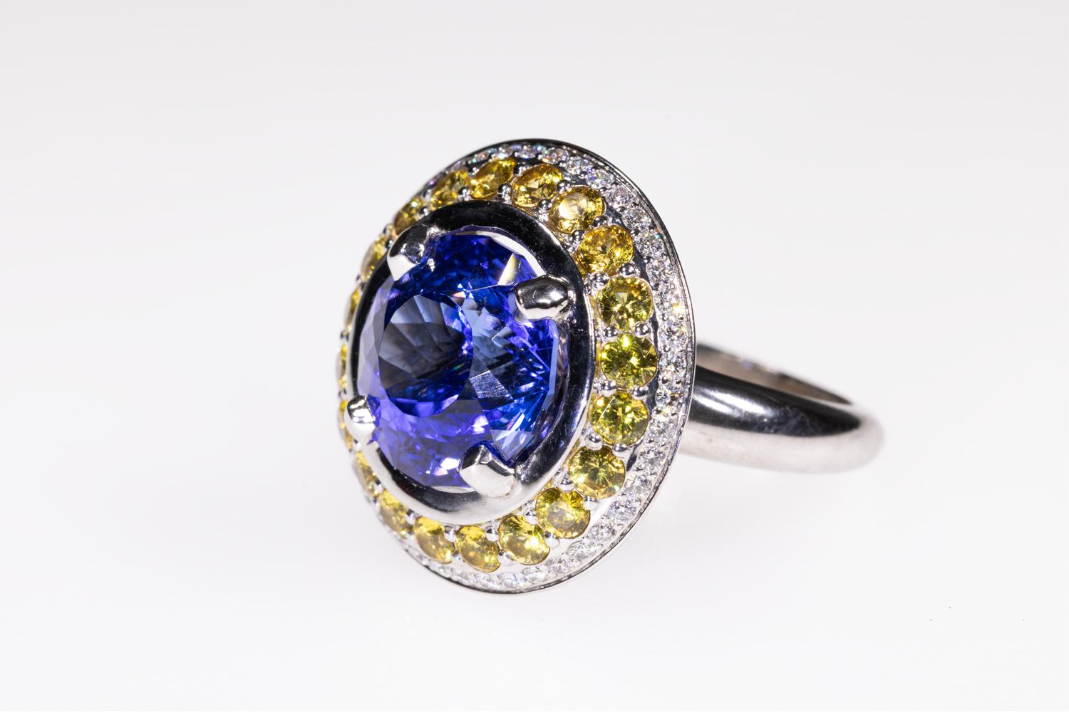 10 Carat Tanzanite Cocktail Ring in 18K WG with Yellow Sapphires & Diamond Halo In New Condition For Sale In Manchester By The Sea, MA