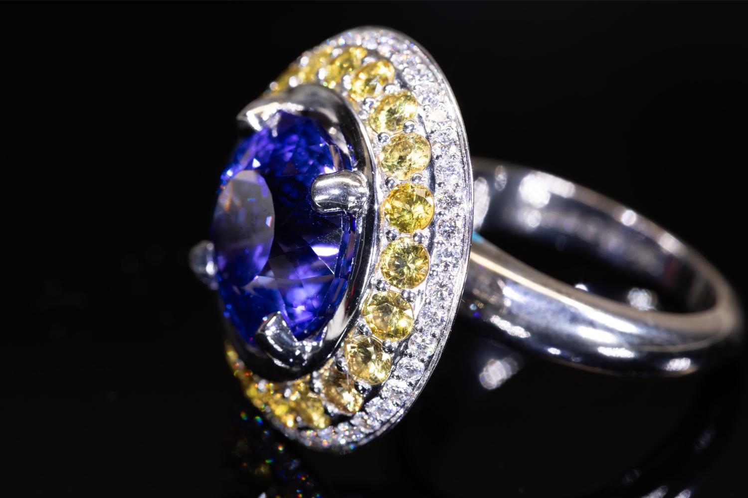 10 Carat Tanzanite Cocktail Ring in 18K WG with Yellow Sapphires & Diamond Halo For Sale 1