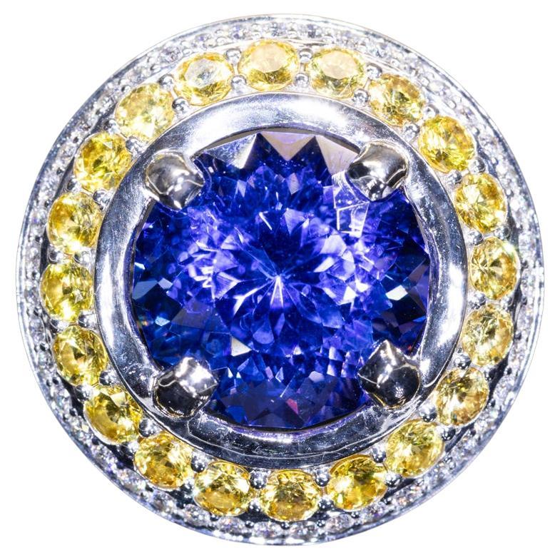 10 Carat Tanzanite Cocktail Ring in 18K WG with Yellow Sapphires & Diamond Halo For Sale