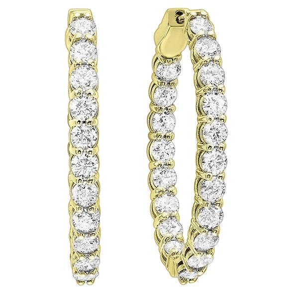Nothing says luxury like an incredible pair of diamond hoop earrings. These stunning brightly polished 14 karat yellow gold inside out oval-shaped hoop earrings feature a total of 42 round brilliant cut diamonds totaling 10.00 carats are prong set