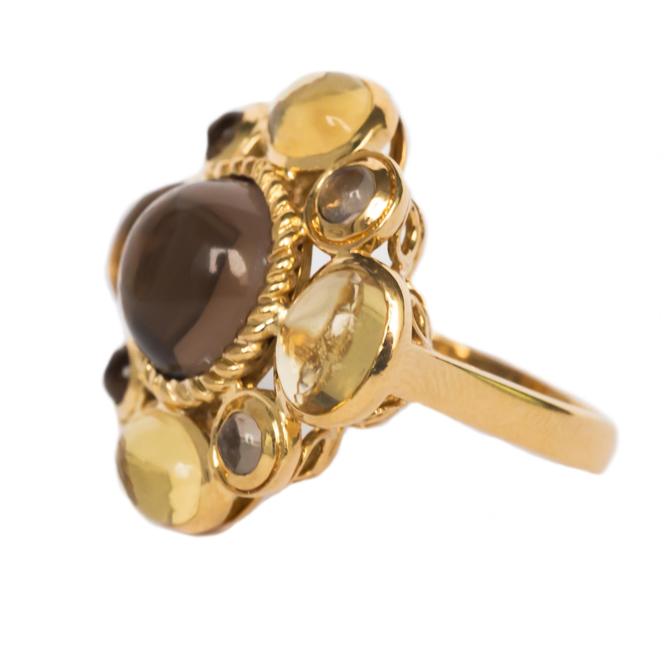 Item Details: 
Ring Size: 5.95
Metal Type: 18 karat Yellow Gold 
Weight: 8.6 grams

Center Stone: 
Assorted Quartz
Carat: 10 carat, total weight 