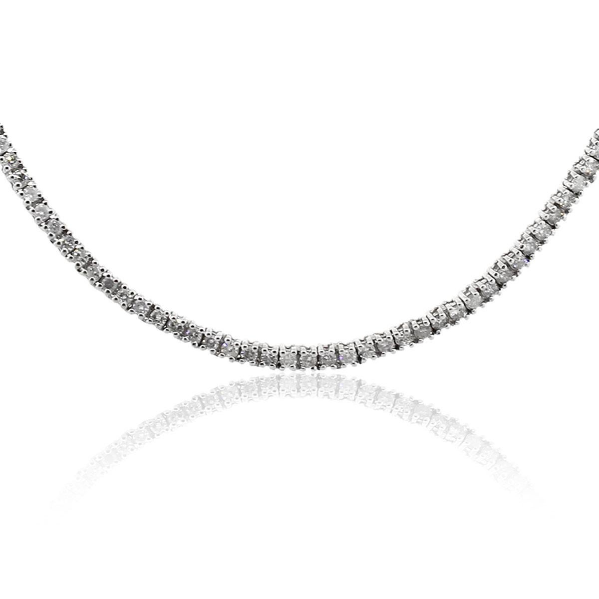Material: 14k White Gold
Diamond Details: Approximately 10ctw of round diamonds. Diamonds are H/I in color and SI-I in clarity
Measurements: Necklace measures 24.75″
Fastening: Tongue in box clasp with safety latch
Item Weight: 30.7g (1938dwt)
SKU: