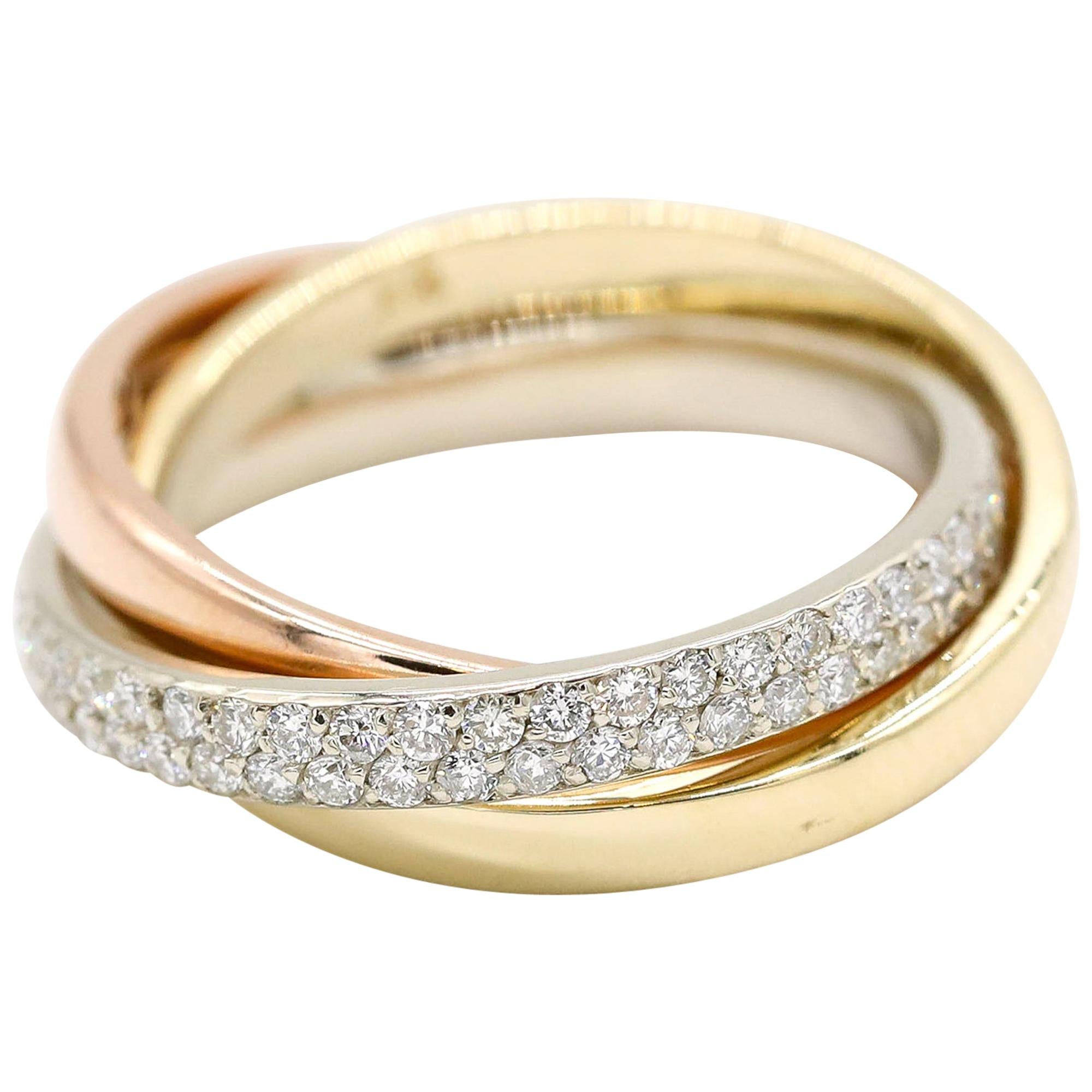 1.0 ctw Classic Triple Band Diamond Ring in 14 Karat Yellow Gold Triple Tone Gold Ring

Three beautiful bands intertwined, symbolizing trinity. A modern, yet classic design. Featuring stunning diamonds encrusted in a double row pavè setting along
