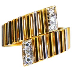Anillo de diamantes de corte redondo tubular de 0,10 quilates 18 quilates H/VS2*.