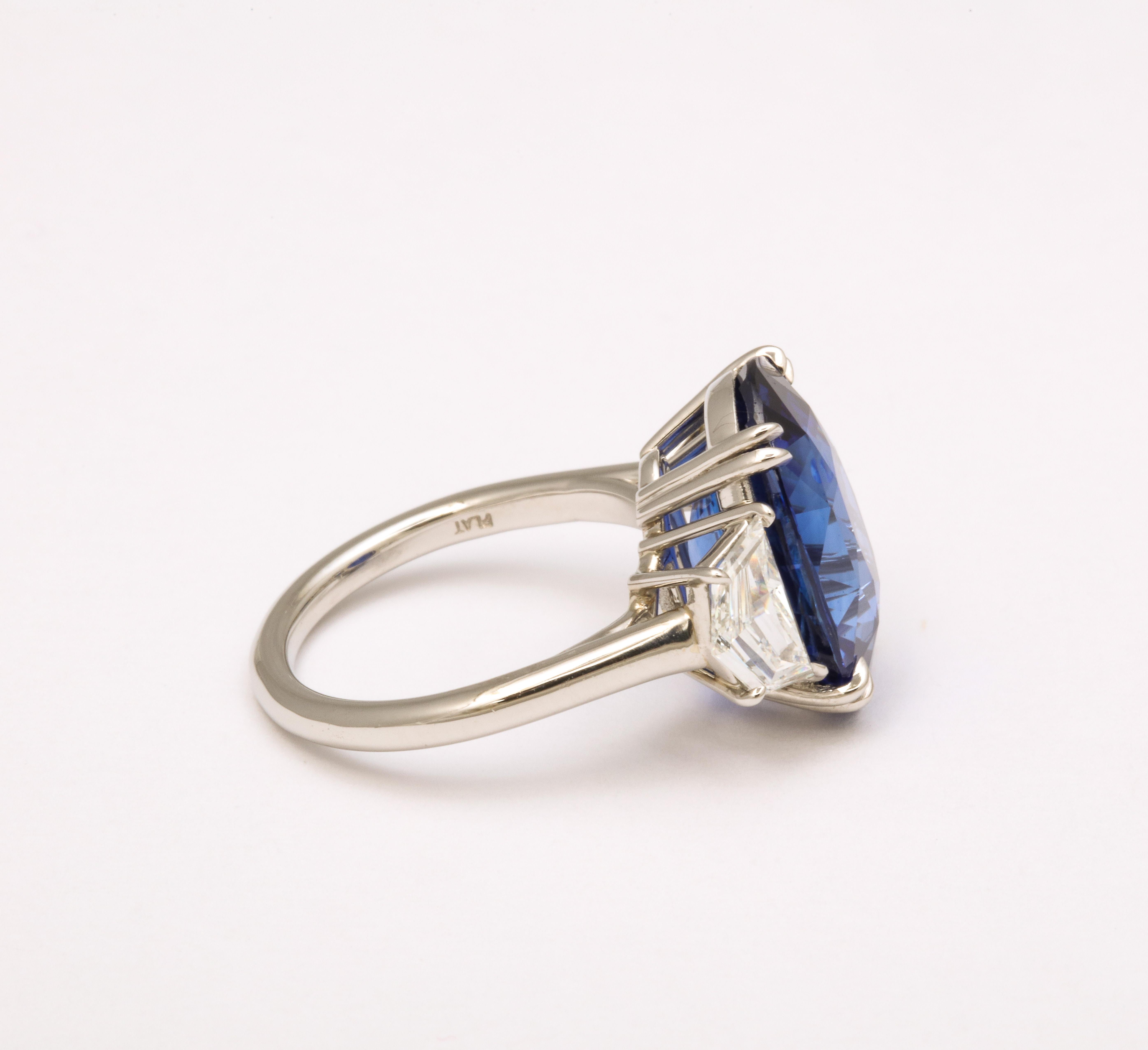 Oval Cut 10 Carat Vivid Blue Sapphire and Diamond Ring For Sale
