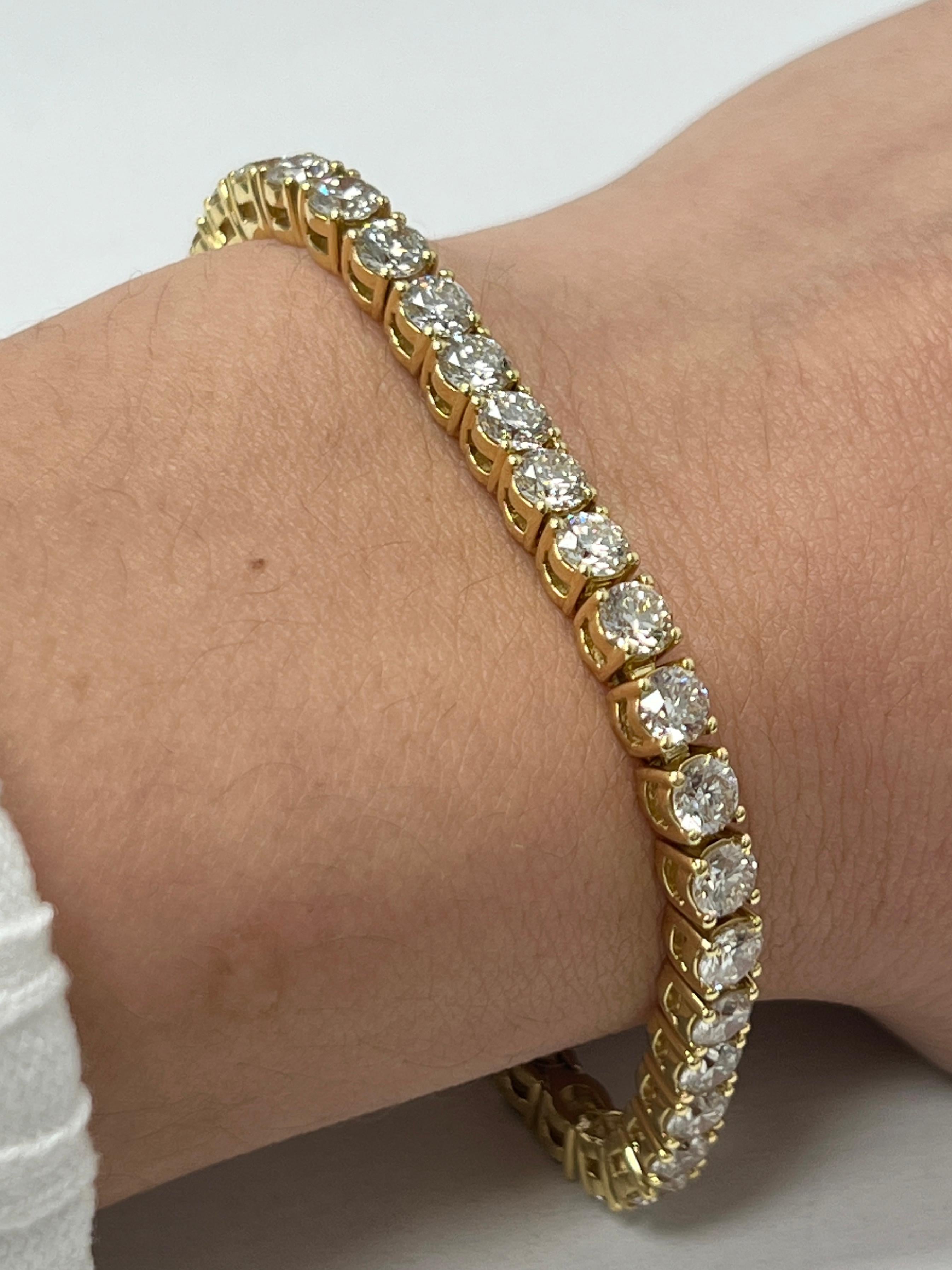 Fashion and glam are at the forefront with this exquisite diamond bracelet. This 14-karat yellow gold diamond bracelet is made from 17 grams of gold. The top is adorned with one row of I-J color, VS/SI clarity diamonds. This bracelet carries 42