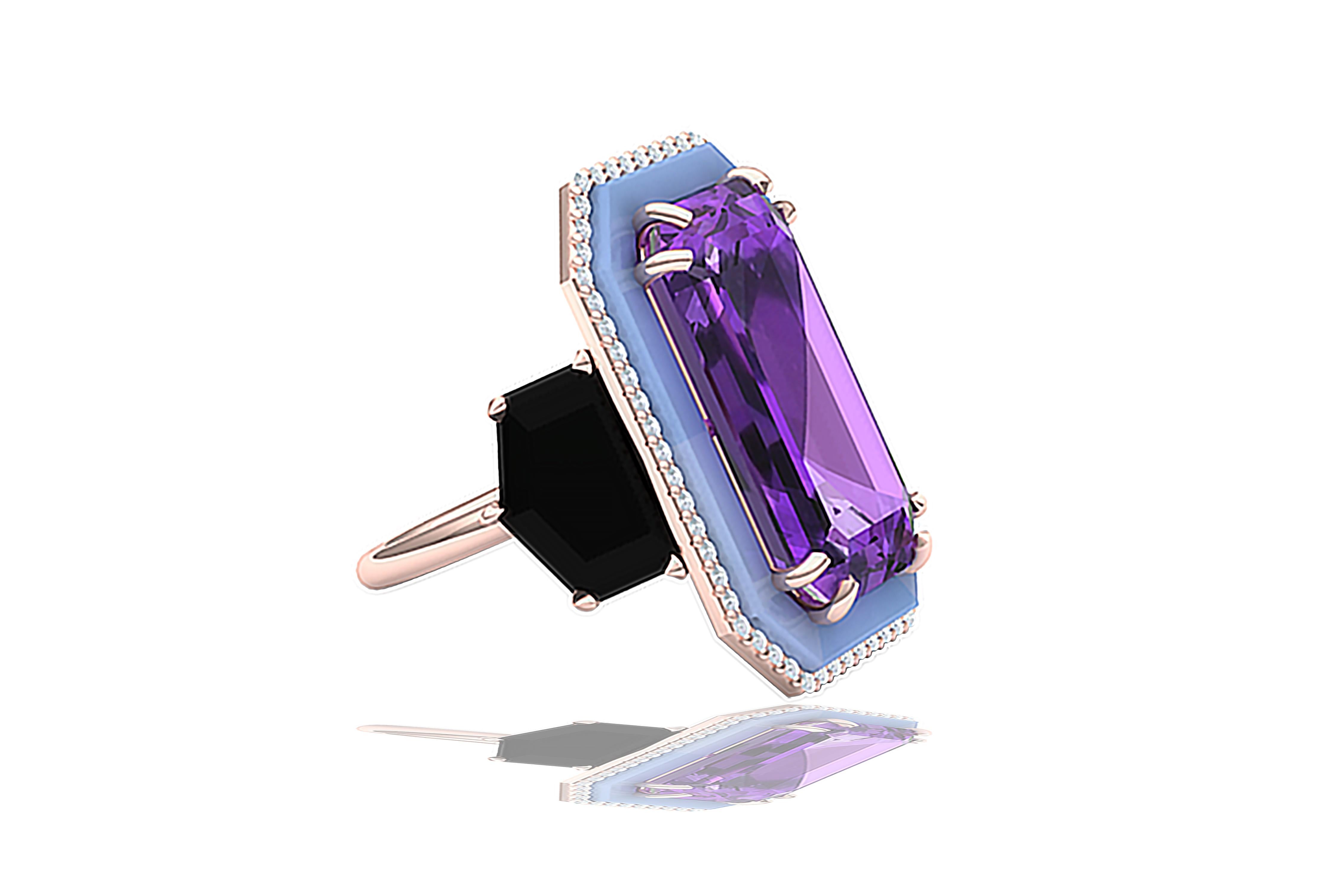 A beautiful elongated emerald cut Amethyst from old material in the 1970's.  This stone shows the difference between itself and its contemporary counterparts. We took a stone that was already unique and added to its splendor with this beautiful