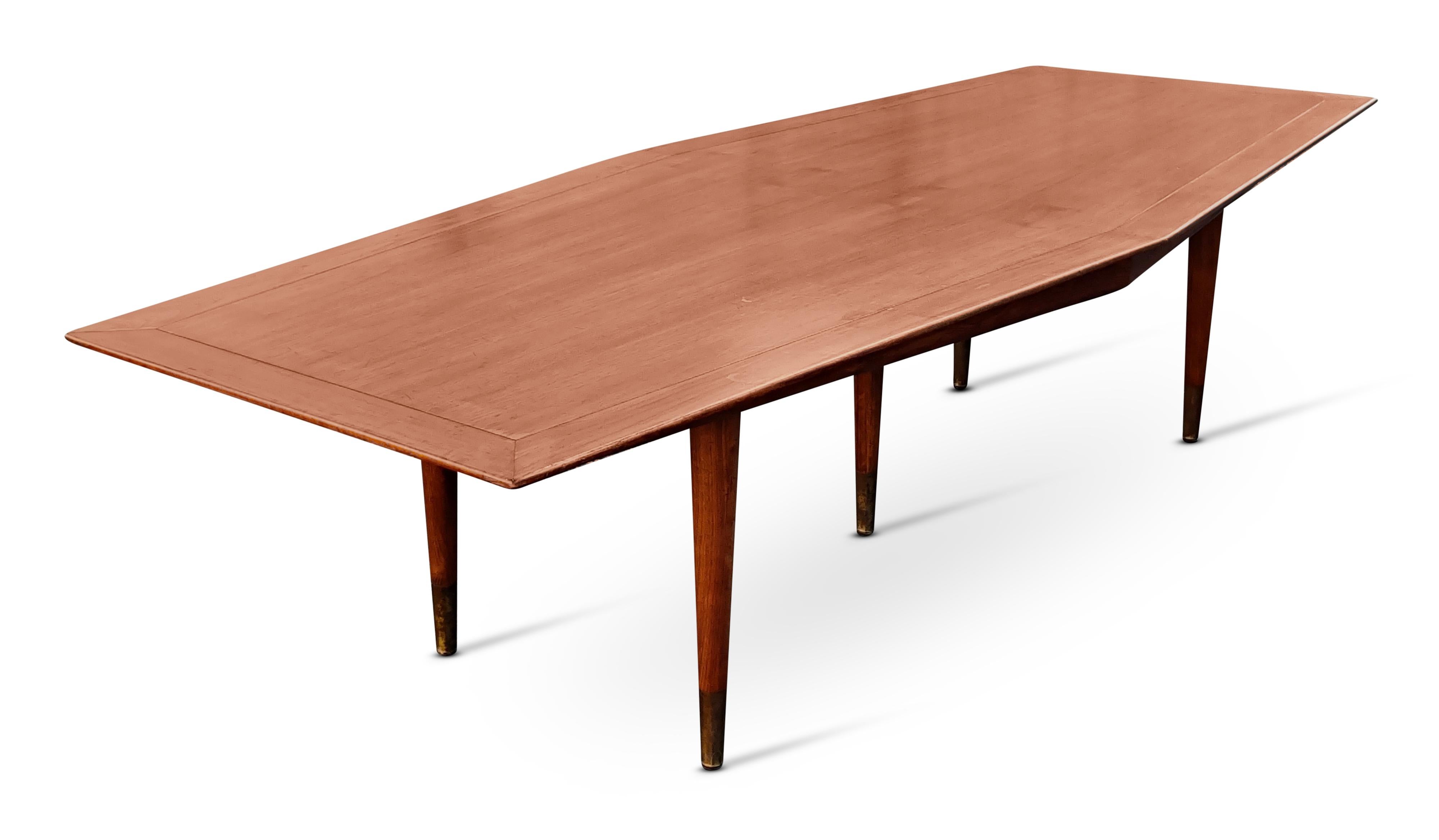 This vintage and classic Stow Davis table is very large (10' long) and very cool! Designed by Giacomo Buzzitta in the 1950s, the design has held up extremely well. Easily one of the most unique and beautiful tables to come out during the MCM era, it