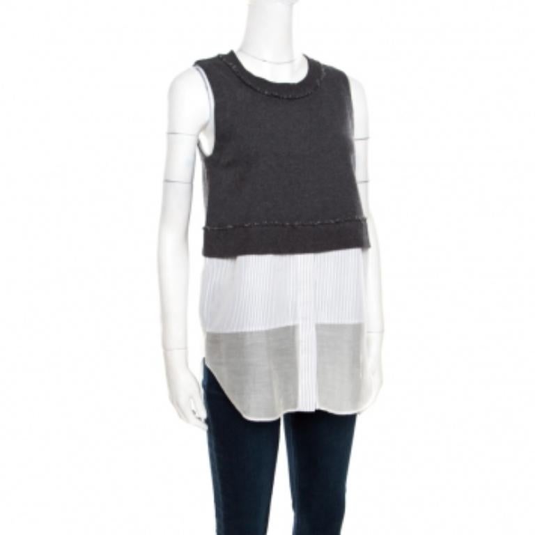 Lo stile è facile con questa camicetta dal design interessante di 10 Crosby Derek Lam. È realizzata in una silhouette rilassata con un mix di tessuti in uno stile a strati che sfoggia una combinazione di tonalità grigie e bianche. Caratterizzata da